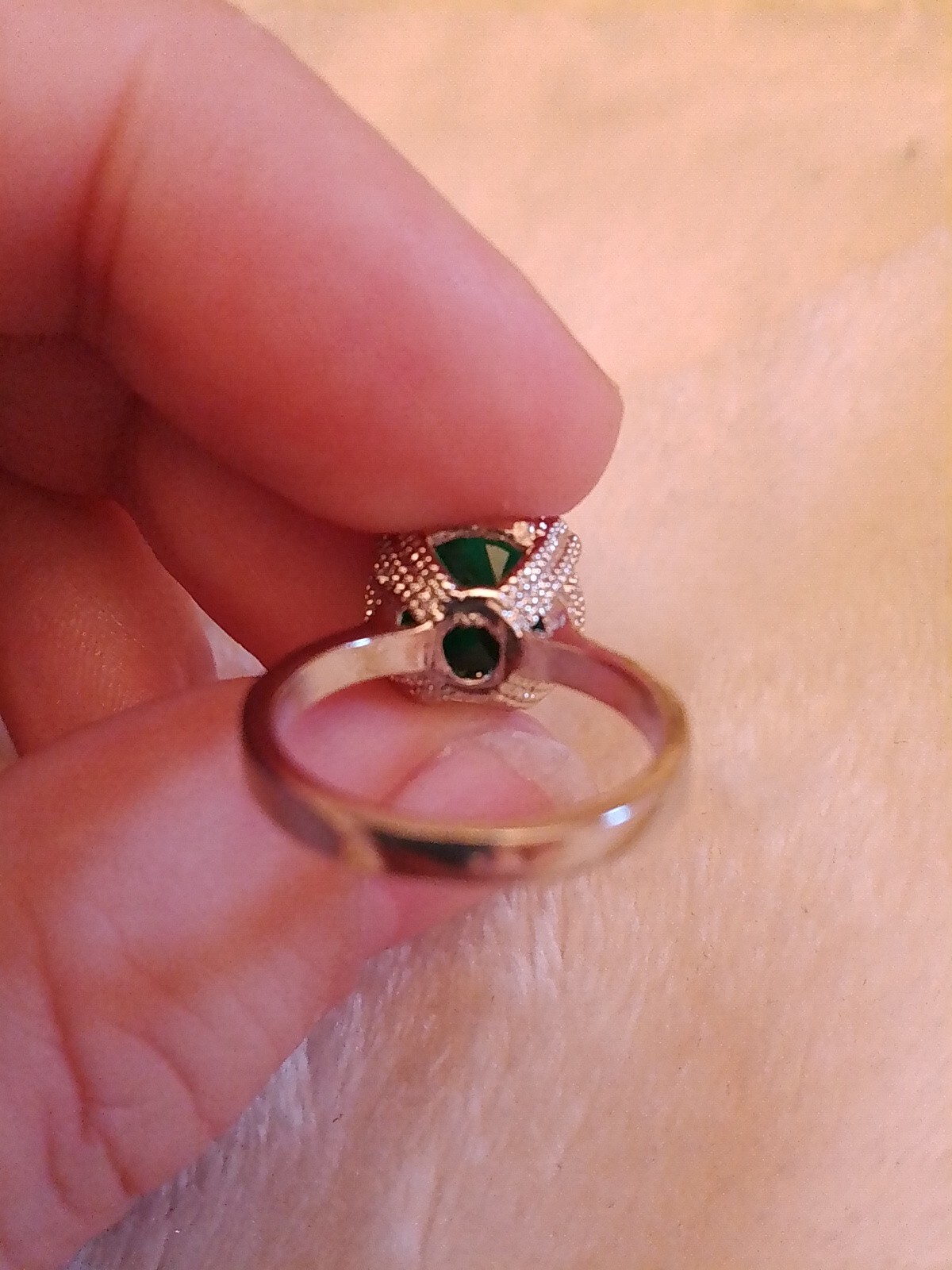 SizeUK J and USA 4.5 Possibly silver Green oval cut claw set ring