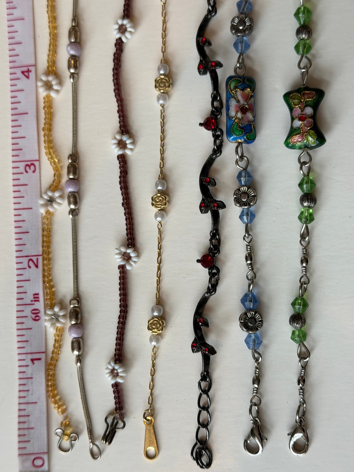 Lot of 7 Thin, Delicate Floral Bead Bracelets, from 6.5″ to 8.5″,