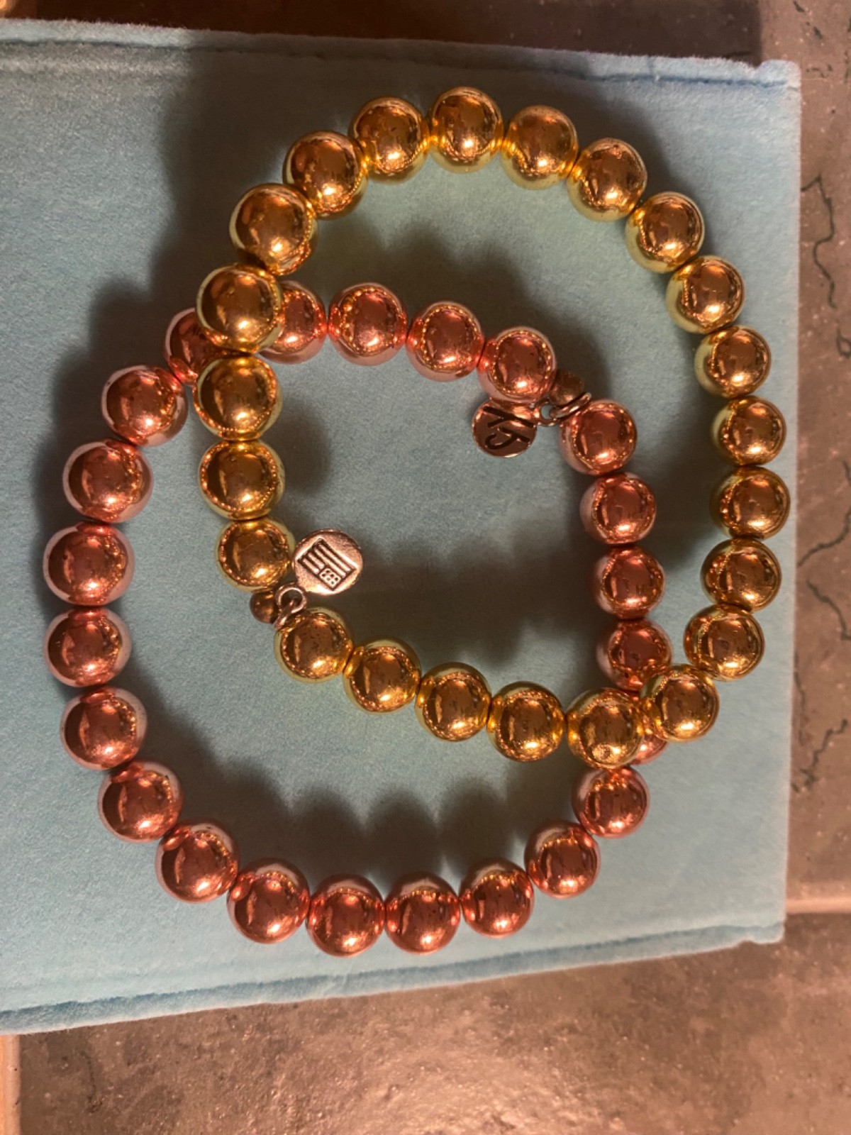 2 T jazelle bracelets pink and gold regular size