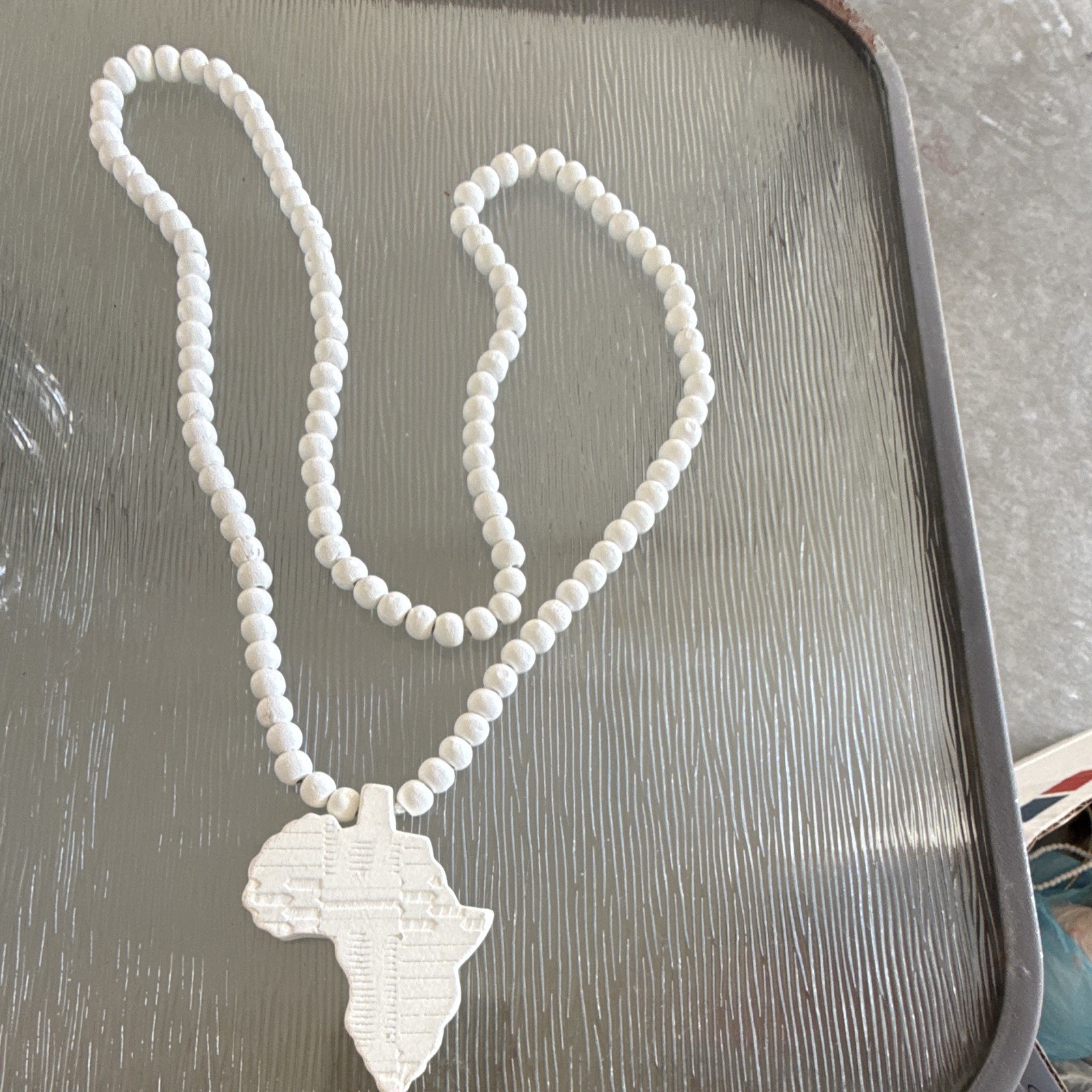 White Plastic Beaded Necklace w/ Silver-Tone Africa Map Charm Pendant