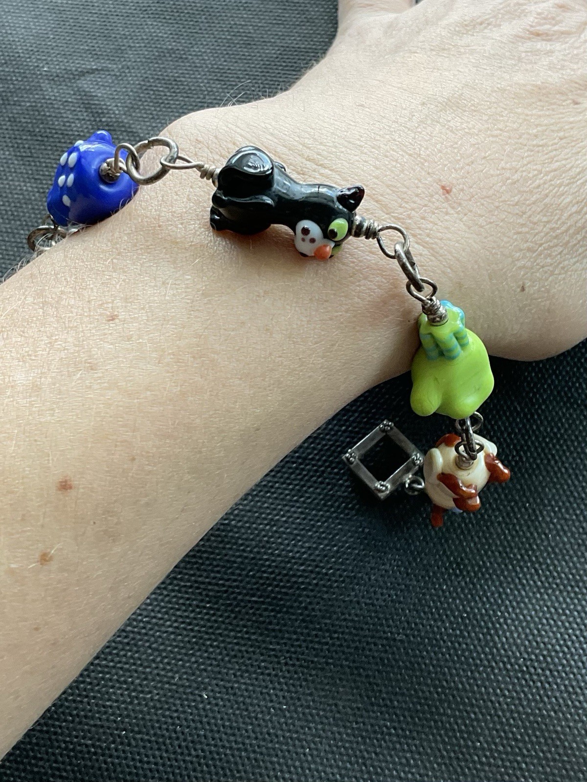 Silver Tone Toggle Bracelet With assorted colorful lampwork glass animal beads