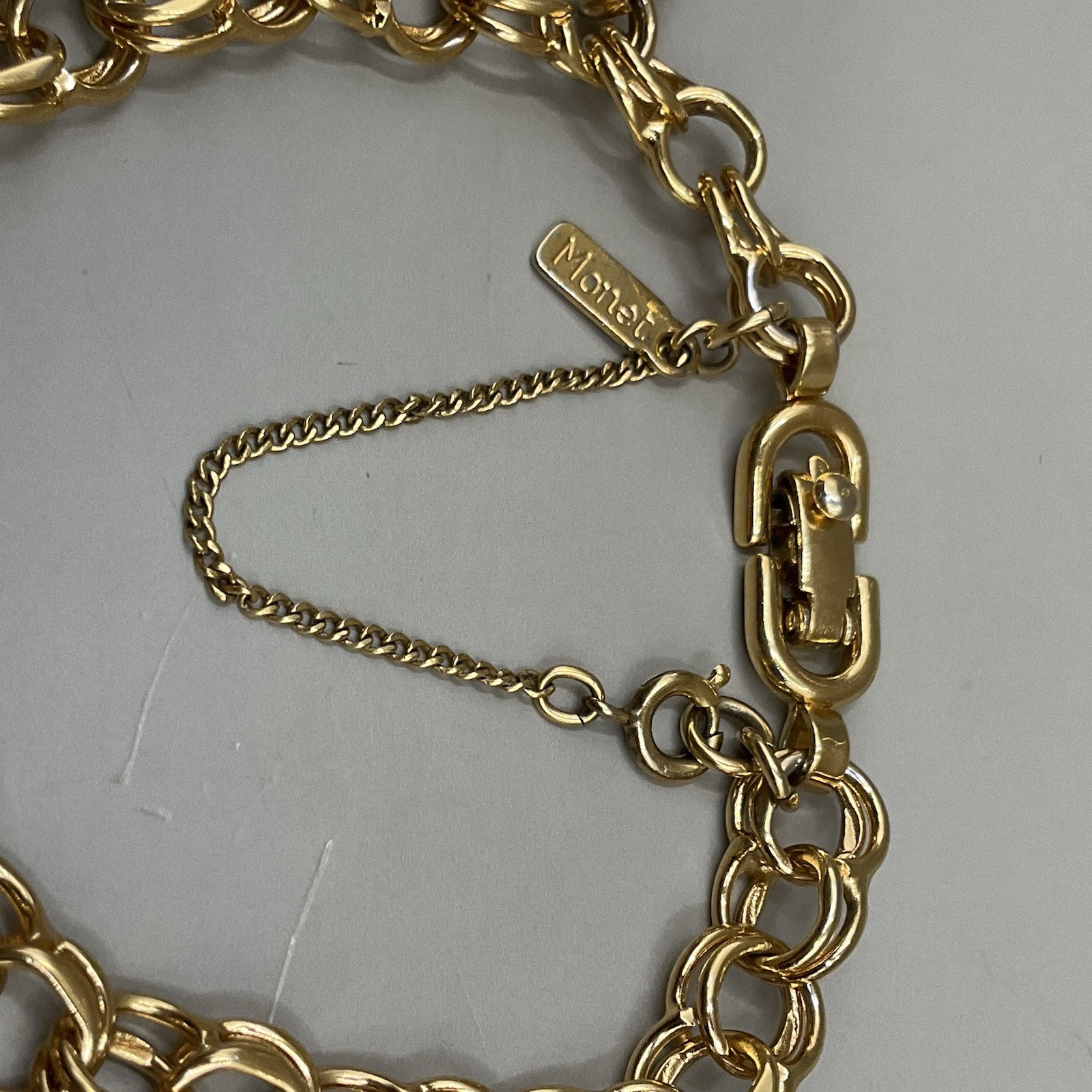 Monet Women’s 7 Charm Bracelet Gold Tone Travel Birthday Puppy Travel Communion