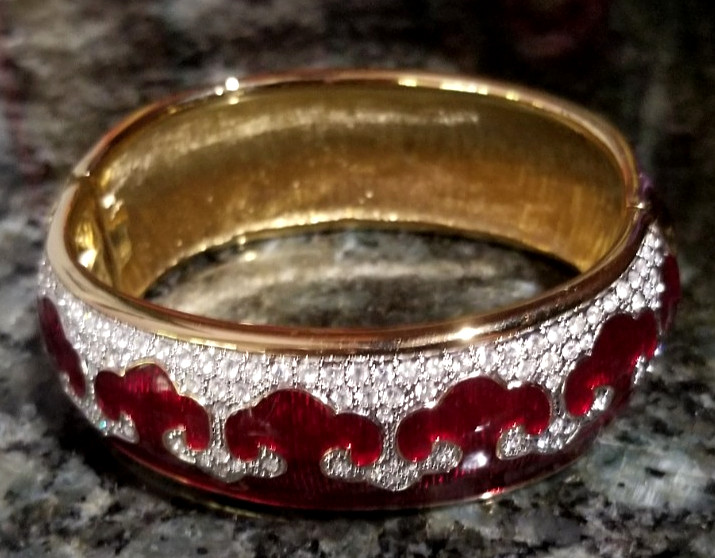 Bejeweled cuff bracelet with Red enamel and Gold tone metal Mint condition