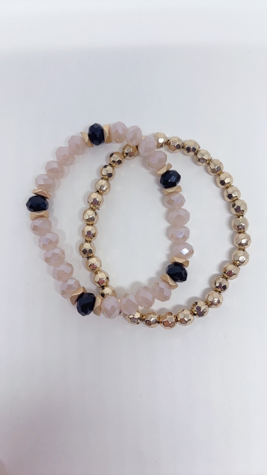 5 Piece Black, Pink, and Gold Bracelets with different Carves and Designs