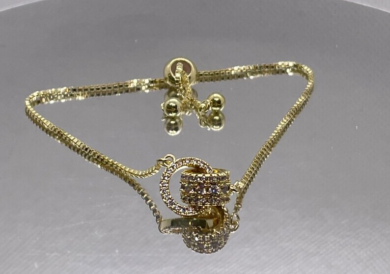 Trendy Circle Interlocked 14k Gold plated lariat bracelet simulated diamonds
