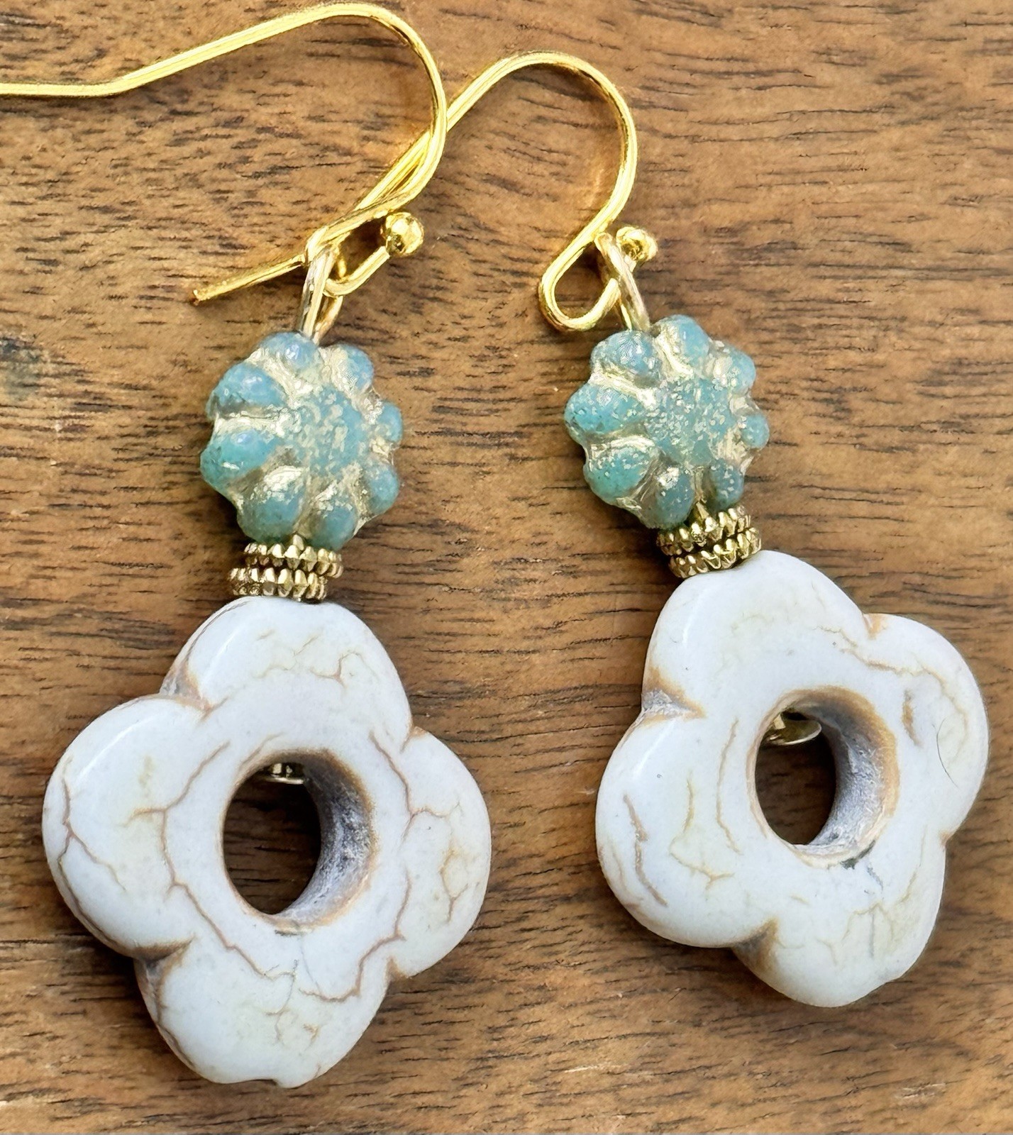 Gold with Green Glass Bead and Ivory Howlite Flower. Clover