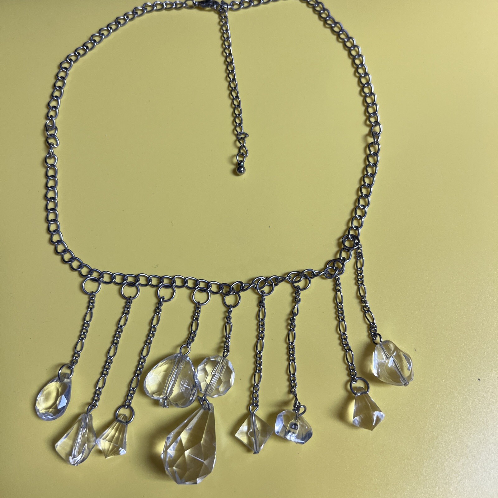 Plastic and silver metal statement necklace