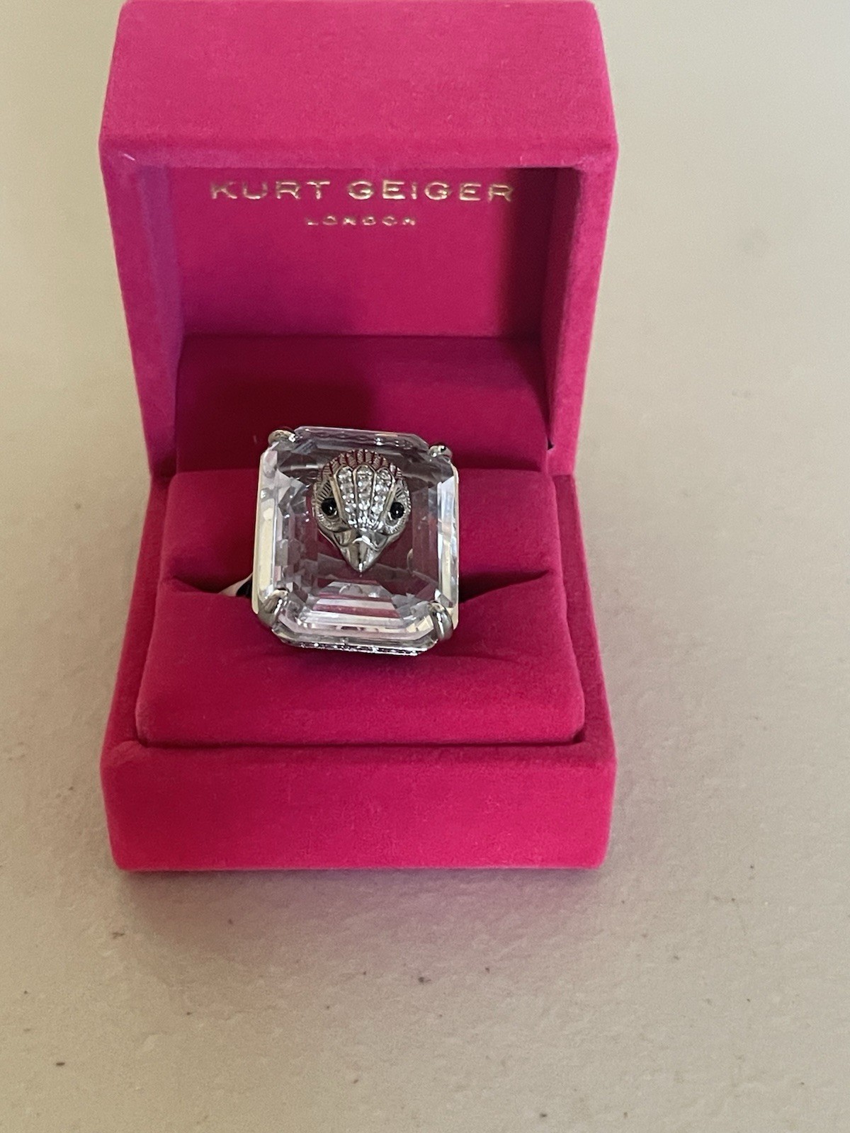 KURT GEIGER LONDON EXTRA LARGE SILVER TONE EMERALD CUT COCKTAIL RING IN CLEAR 8