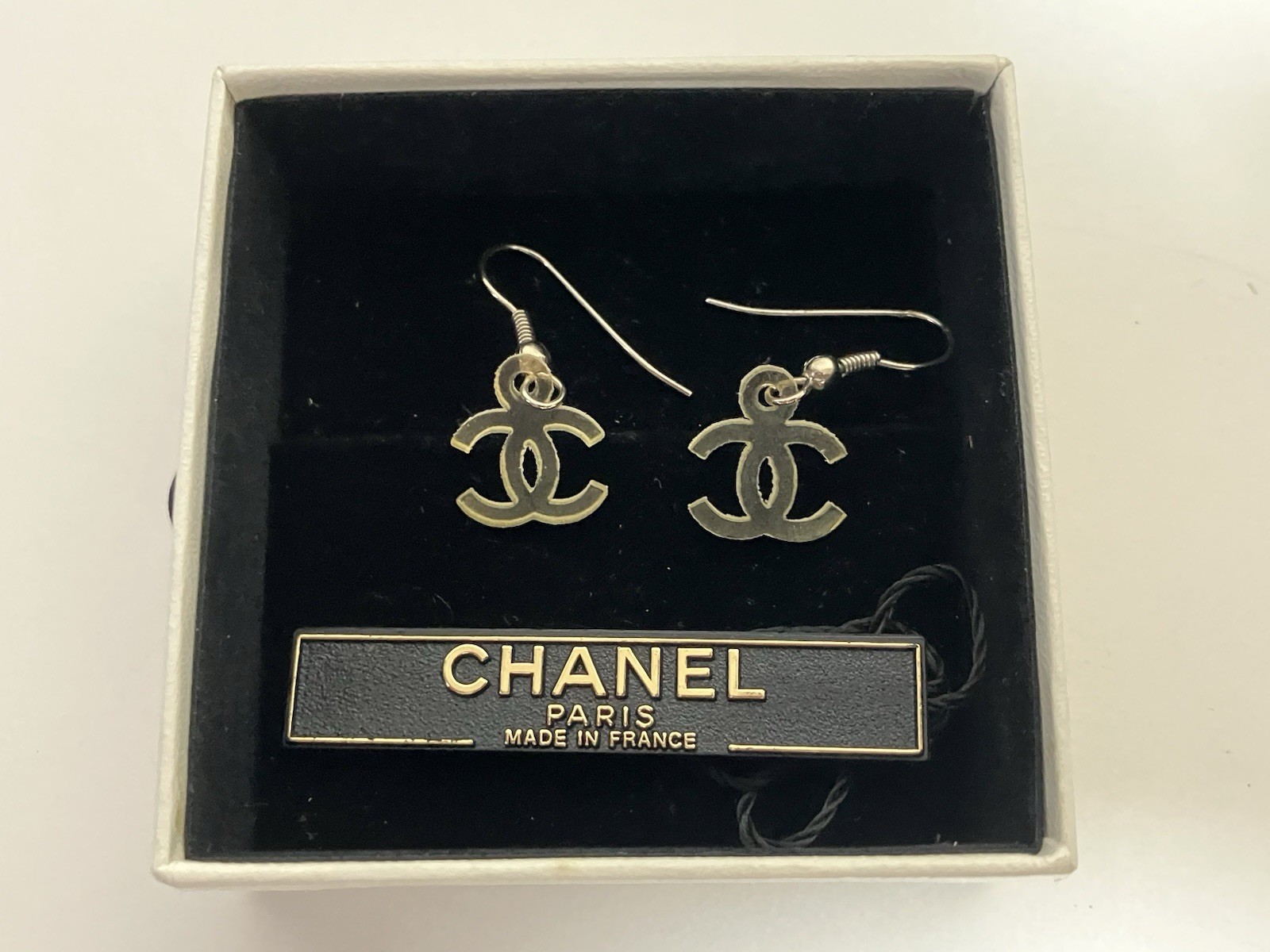 Authentic Vintage CHANEL CC Logo Resin Hook Earrings 95C Cruise Ivory w/ Box