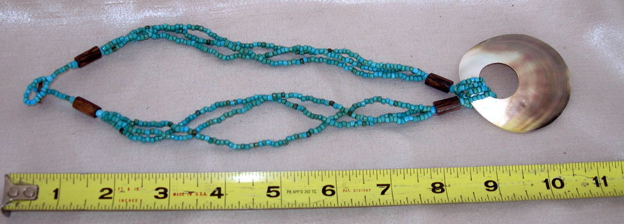Santa Fe Style Turquoise Color Bead Three Strand Necklace with Shell Centerpiece