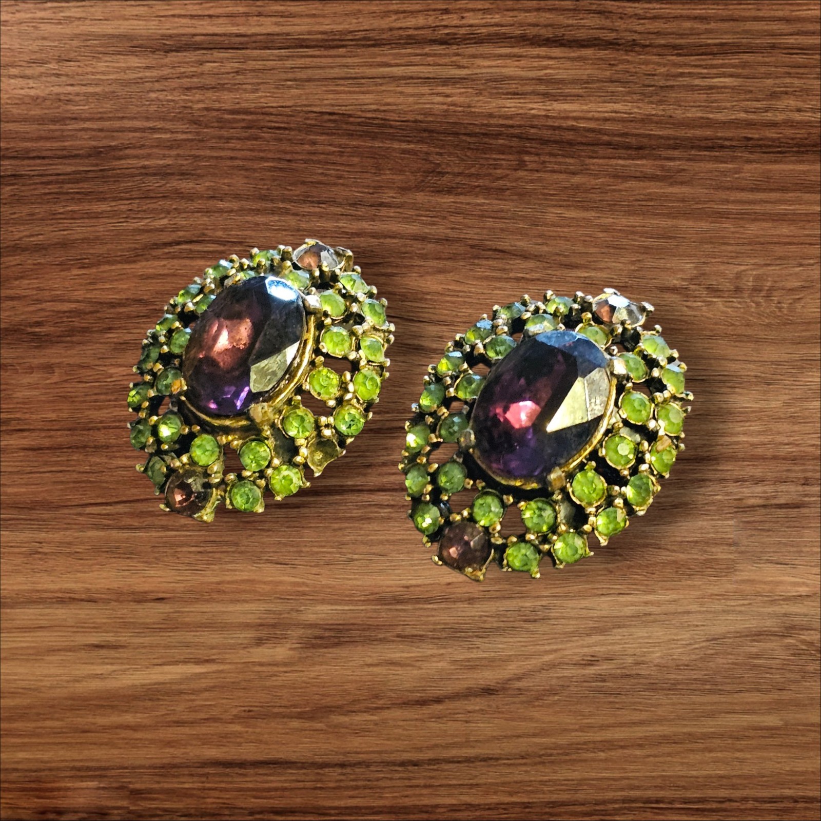 VTG 1960s purple and green rhinestone cluster clip on earrings in a gold tone