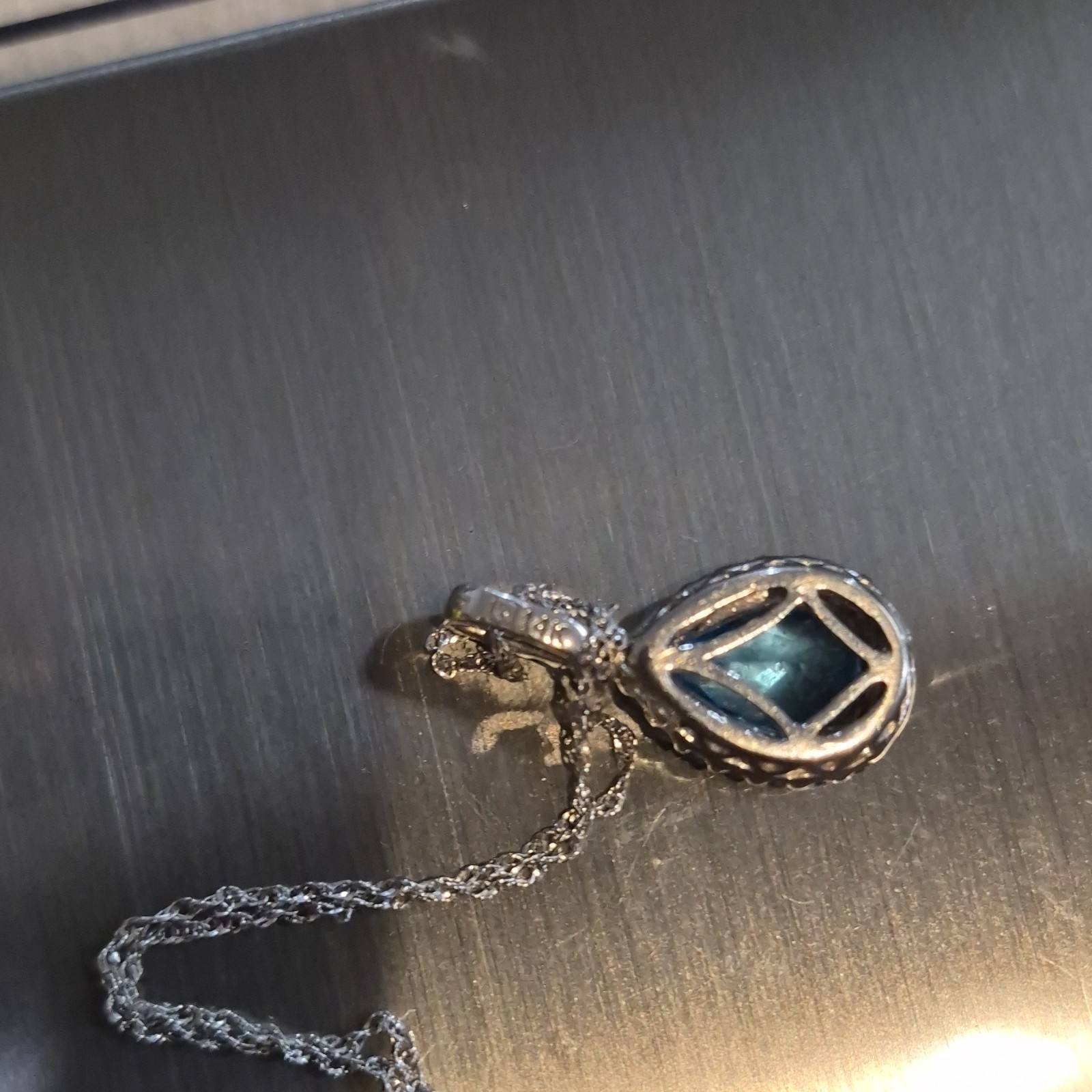 14kt white gold blue topaz and diamond accented necklace 18 inch chain