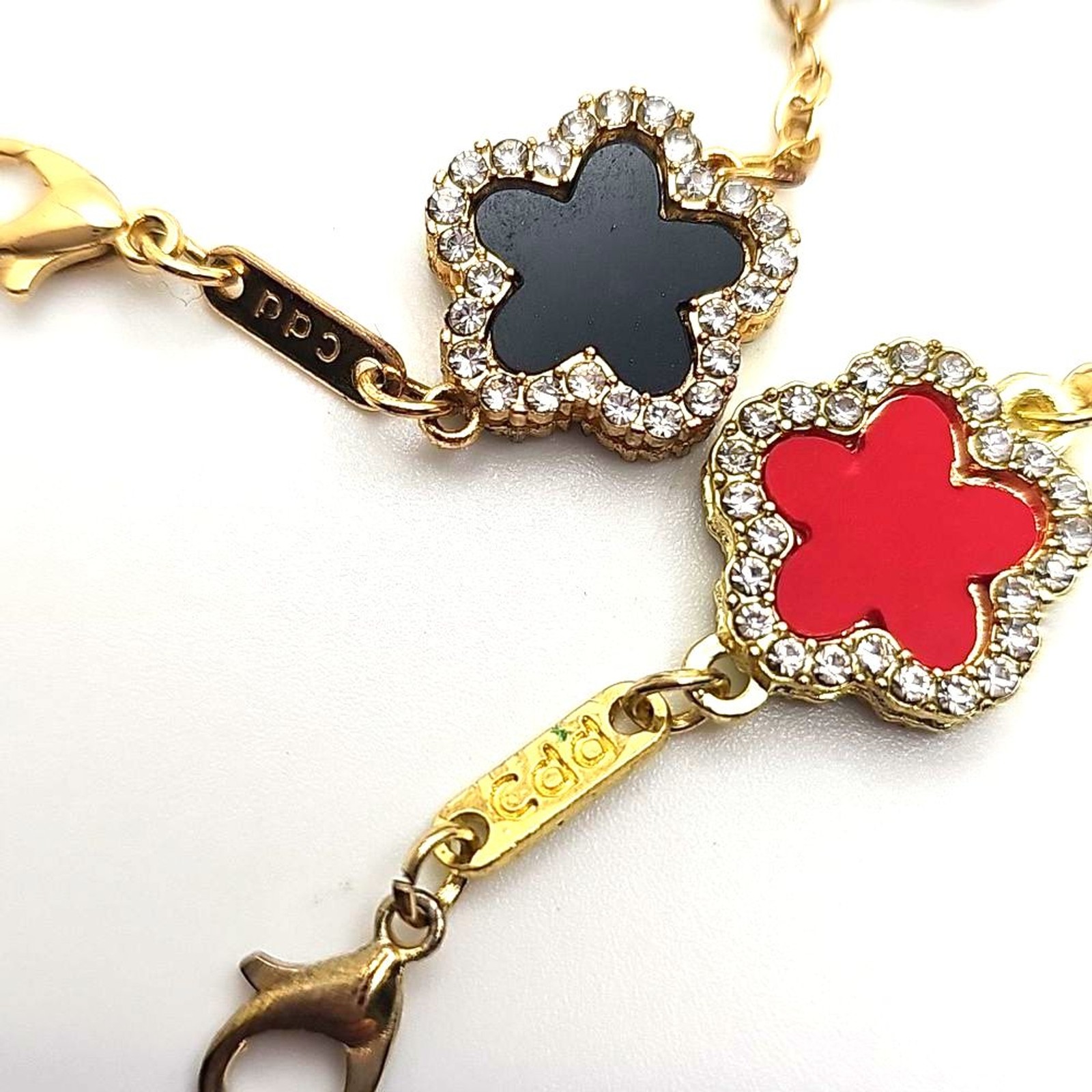 Bracelets by cdd Rhinestones One black one multicolored Goldtone Hardware