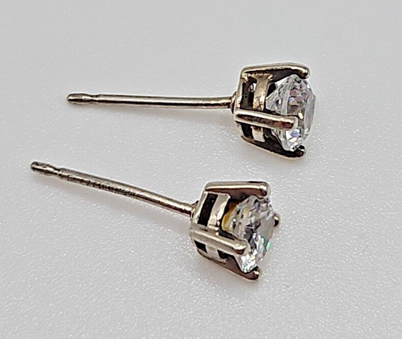 2 sets of cubic zirconia stud earrings. See Pictures & Description!! Pre loved