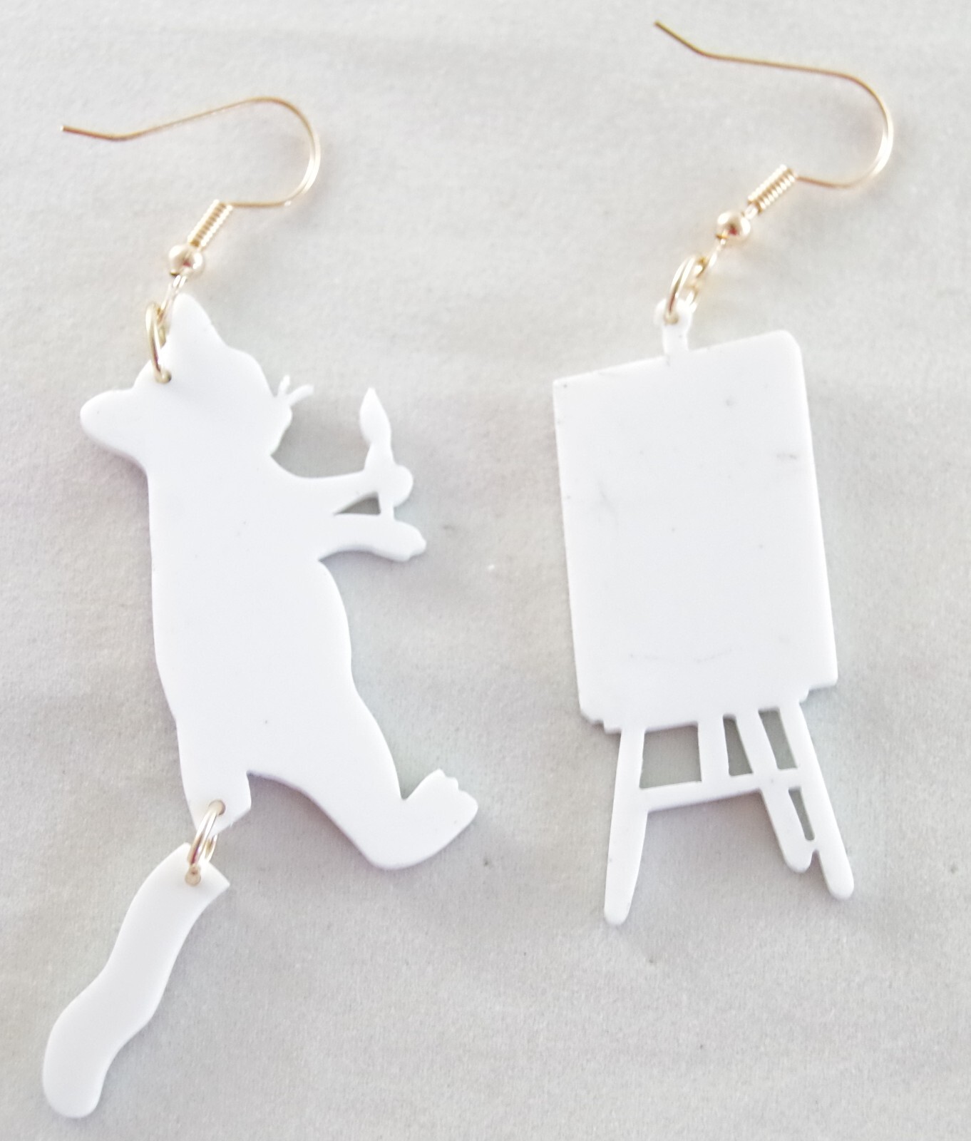 ASYMMETRICAL RACOON ARTIST PAINTING FLOWERS IN GARBAGE CAN ACRYLIC DROP EARRINGS