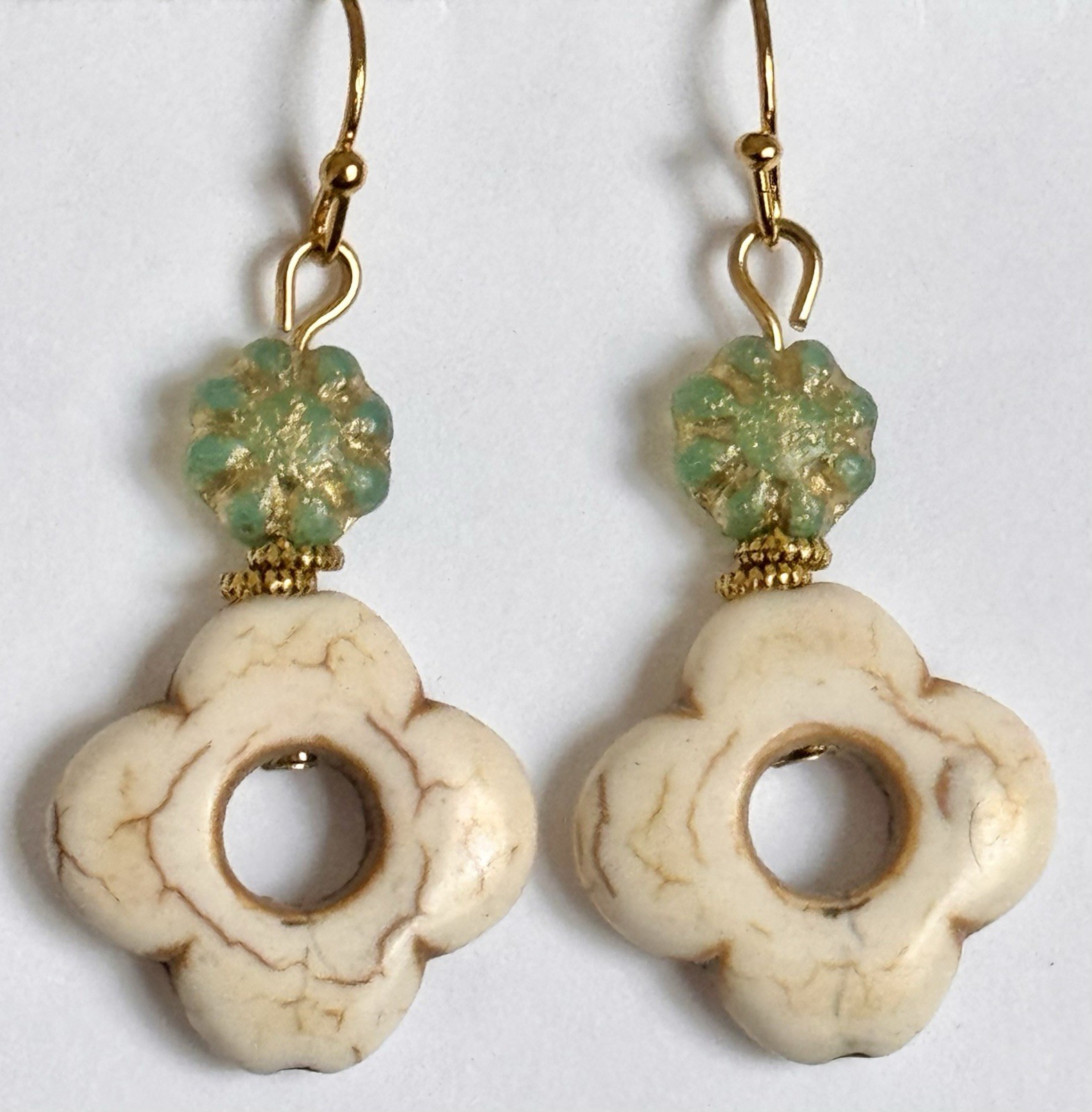 Gold with Green Glass Bead and Ivory Howlite Flower. Clover