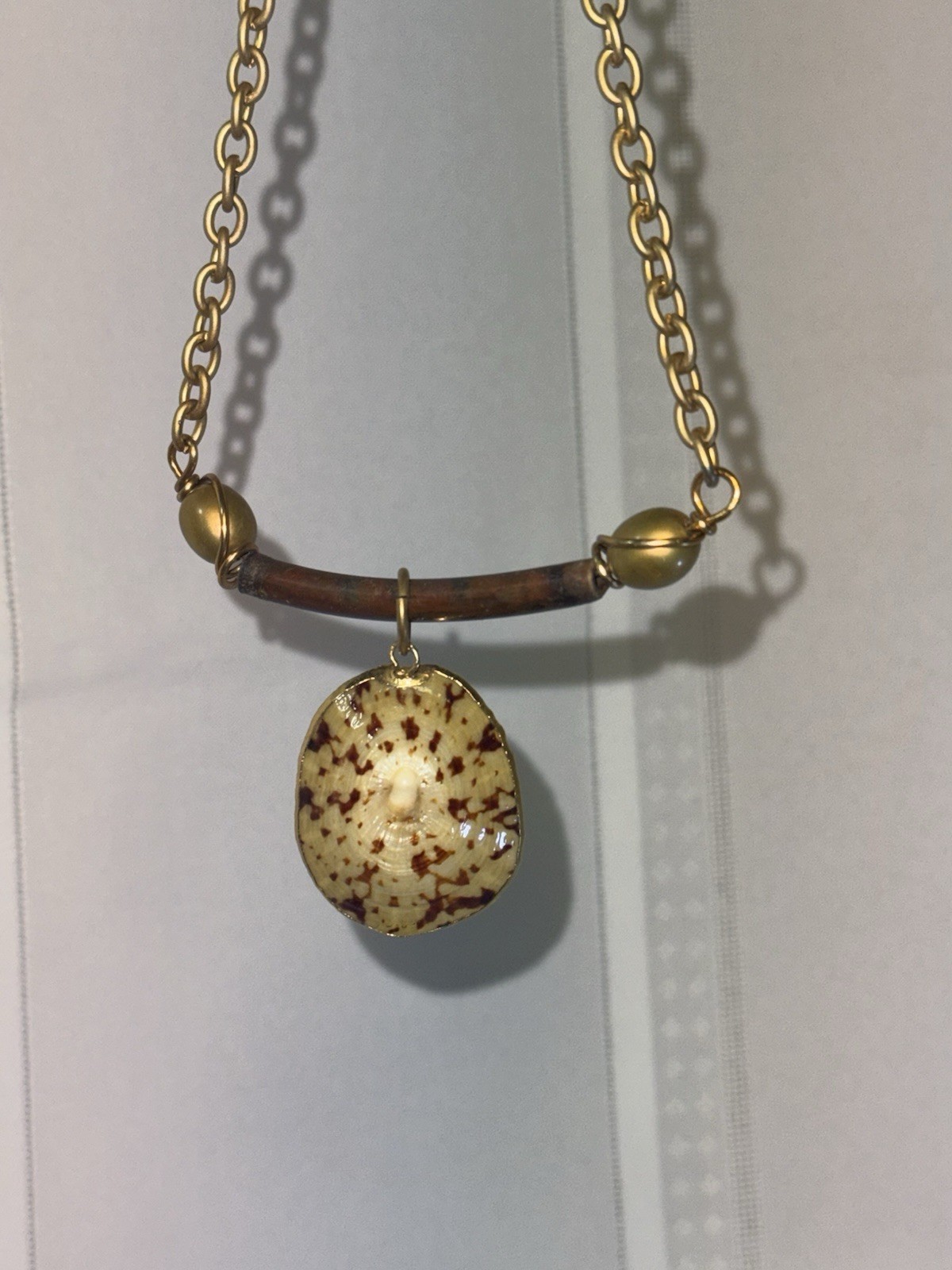 Gold Chain Necklace with Asymmetrical Charm Pendant, Wood Accent, Beads