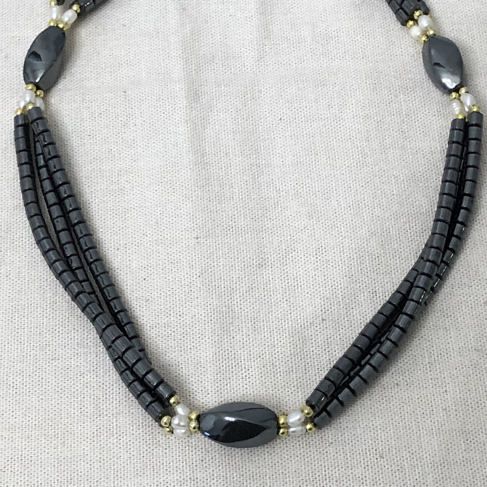 Triple Strand Hematite Stone Necklace Faux Pearls & Goldtone Spacers Length 32”