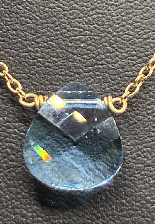 Touchstone Light Sapphire, Briolette, Swarovski Crystal Gold Tone Necklace
