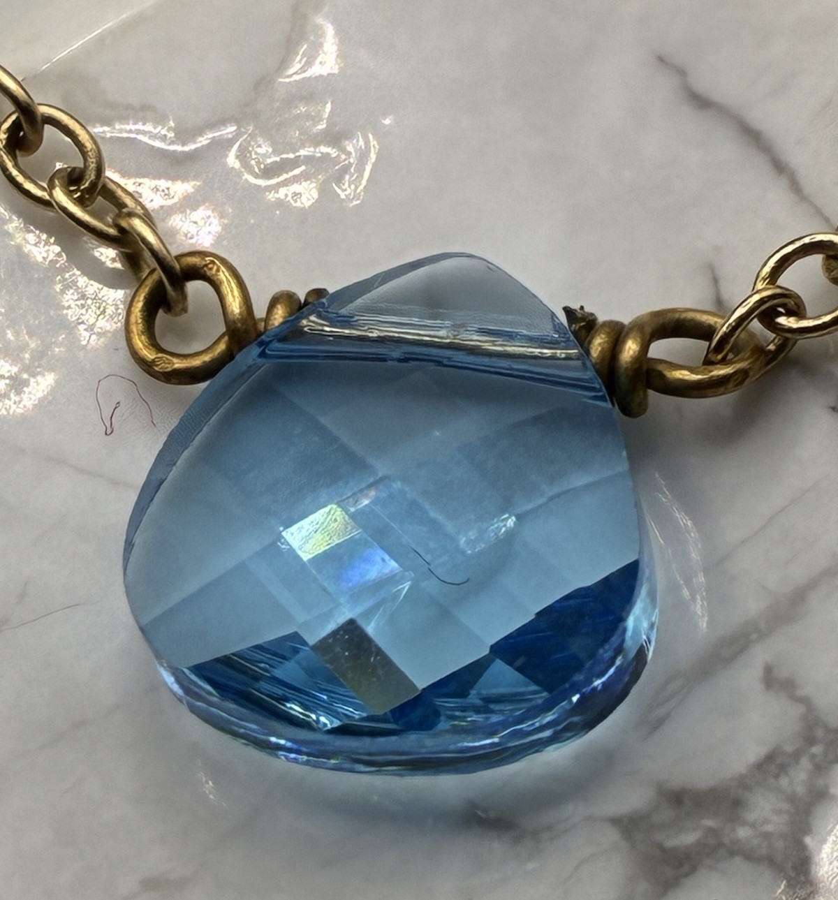 Touchstone Crystal Light Sapphire Briolette and Bead Gold Tone Necklace