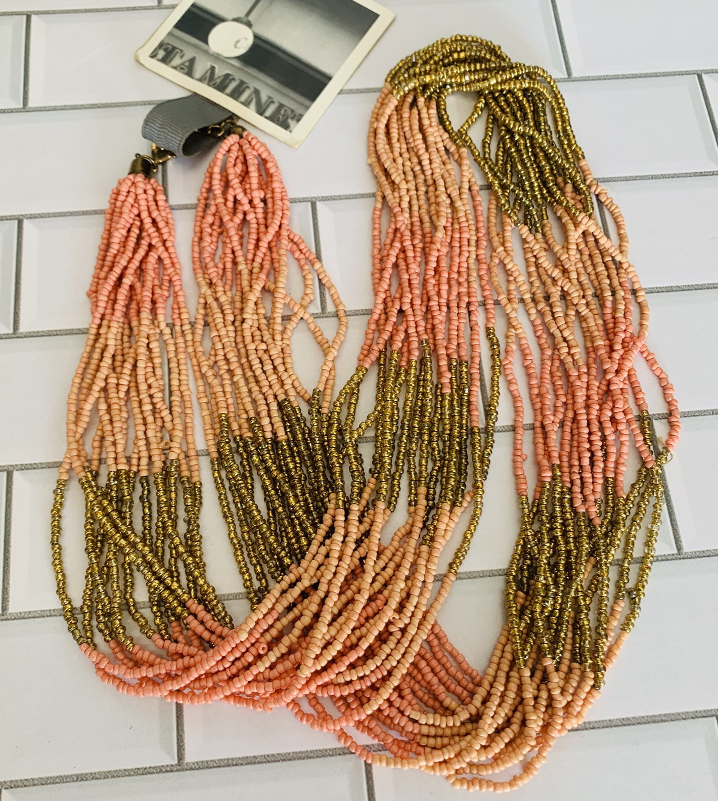 New Seed Bead Necklace by Anthropologie salmon pink gold NWT $38. Multi Strand