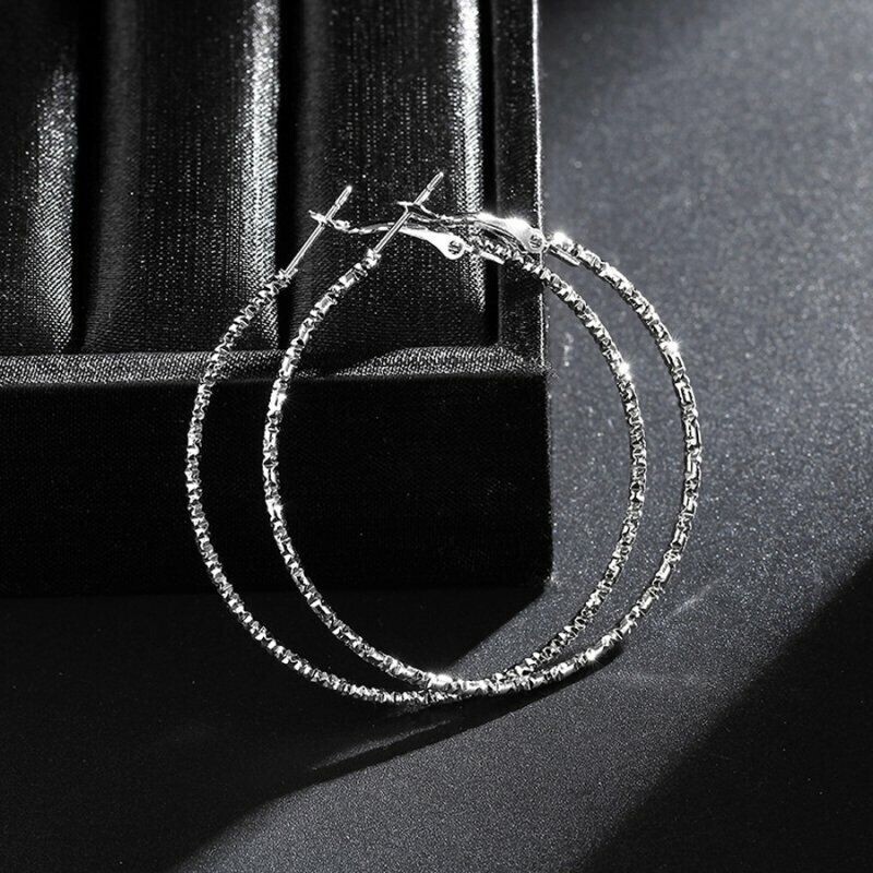 Pretty New Silver Plated Nicely Textured Round 2″ Omega Back Hoop Earrings