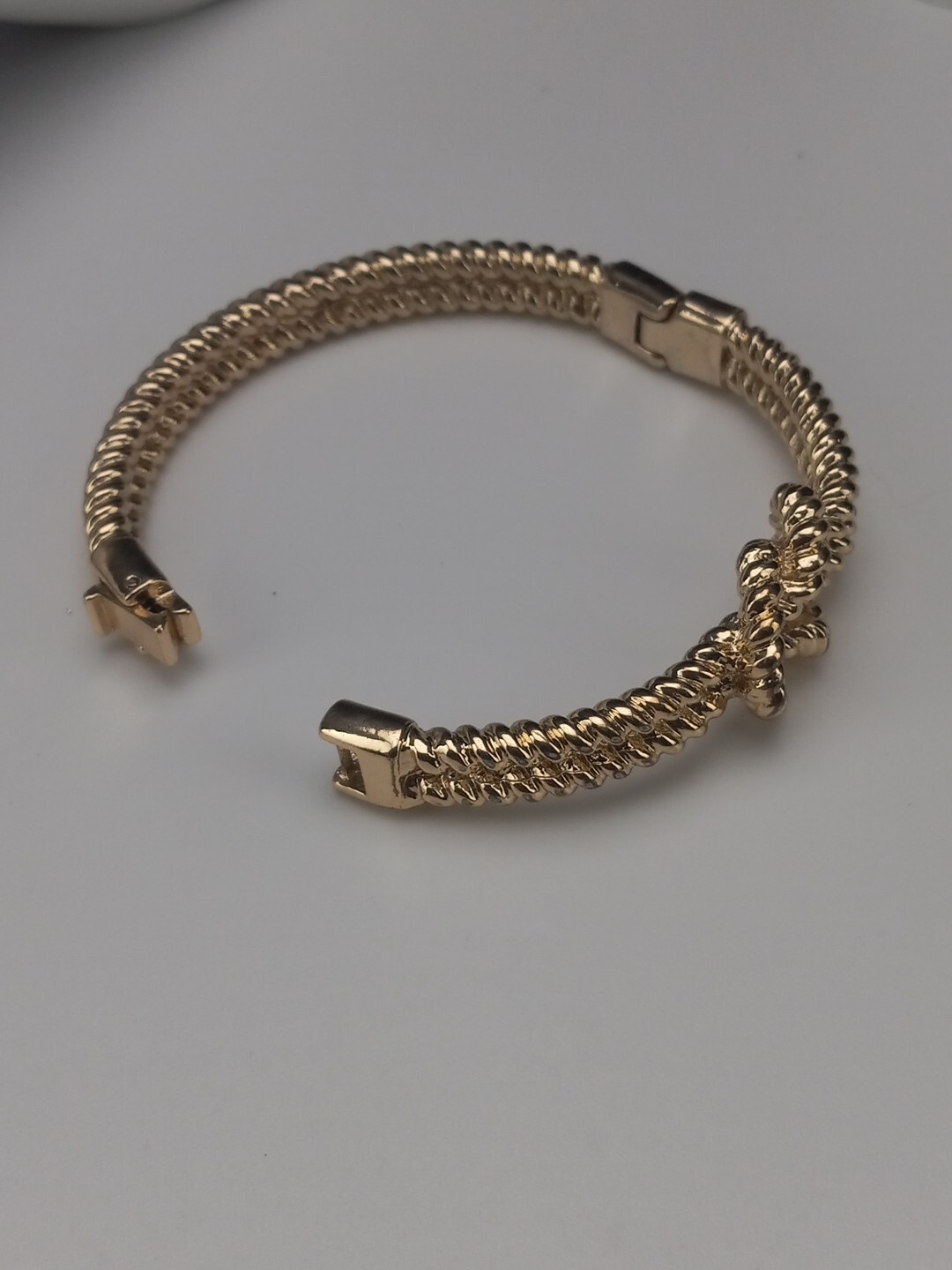 Gold Tone Love Knot Textured Twisted Design Size 7 Push Lock Bracelet