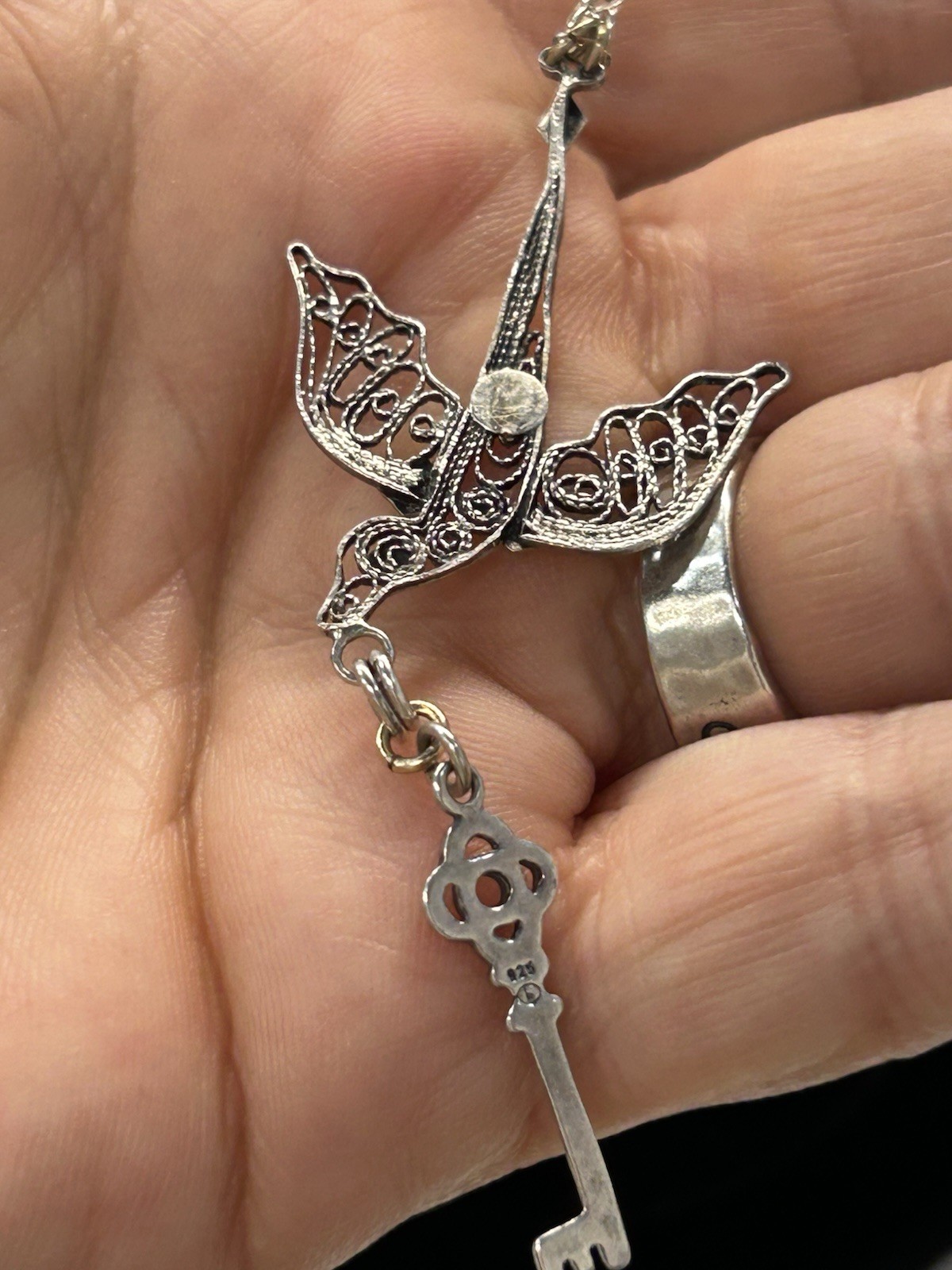 Sterling Silver beautiful and delicate bird with key necklace