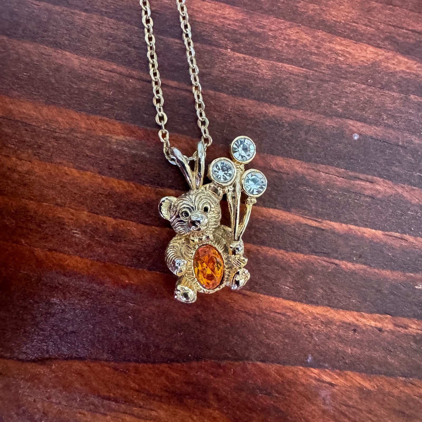 DM99 Gold Tone Teddy Bear Balloon Pendant Necklace Rhinestone Orange Clear 16″