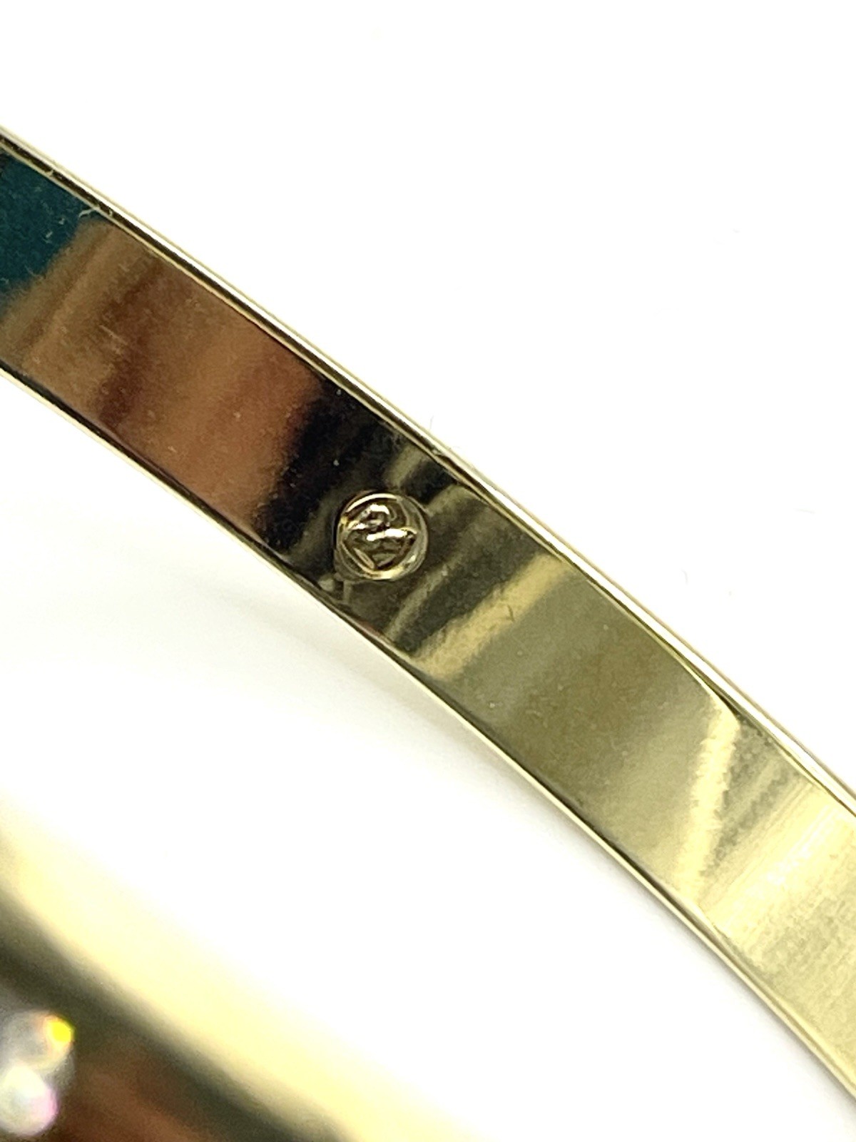 Swarovski Gold Tone Bangle Bracelet with Scattered Crystal Accents Swan Logo