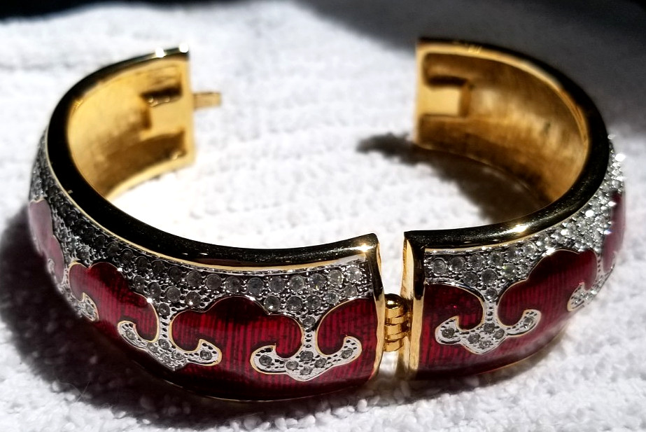 Bejeweled cuff bracelet with Red enamel and Gold tone metal Mint condition