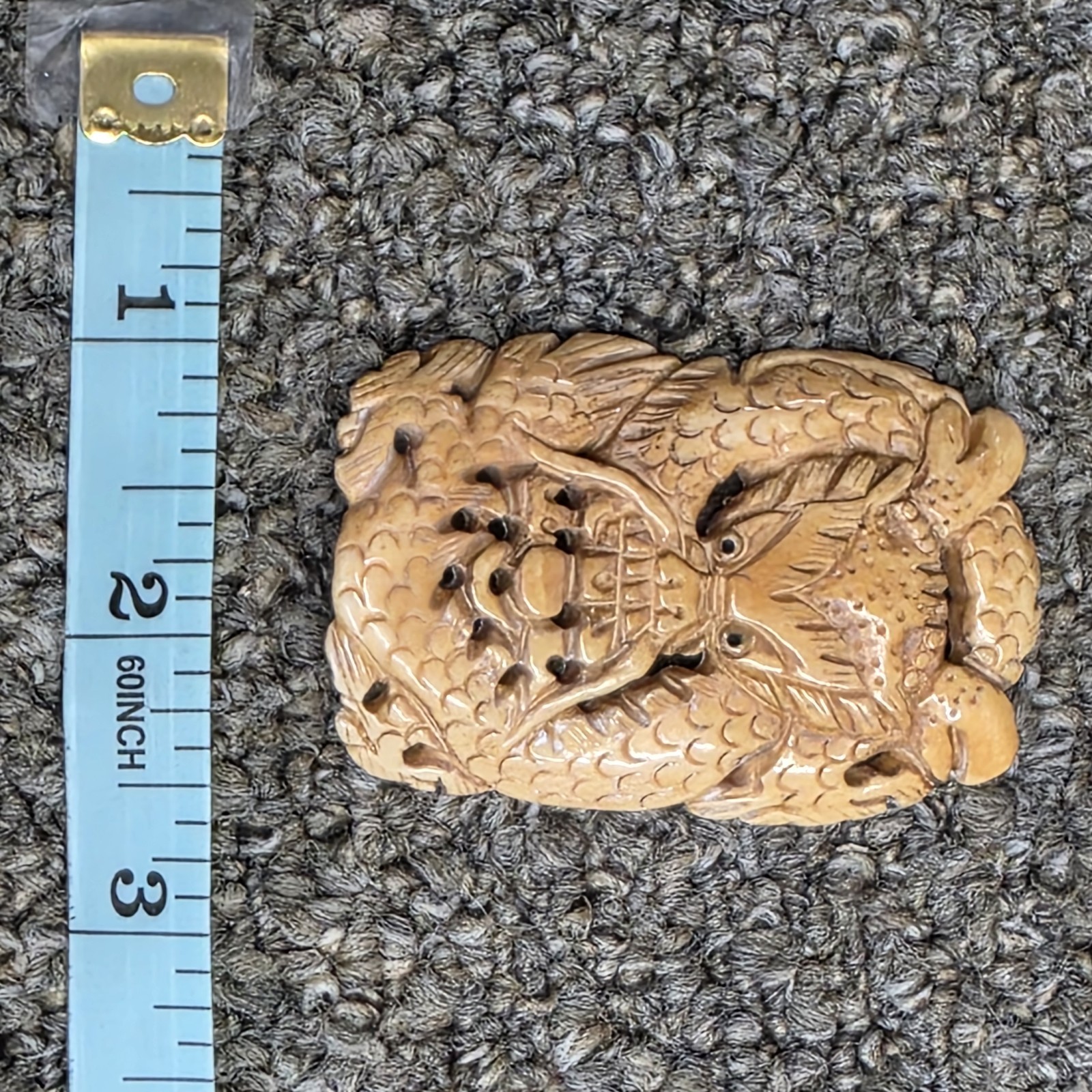 vigorous cow bone carved dragon pendant