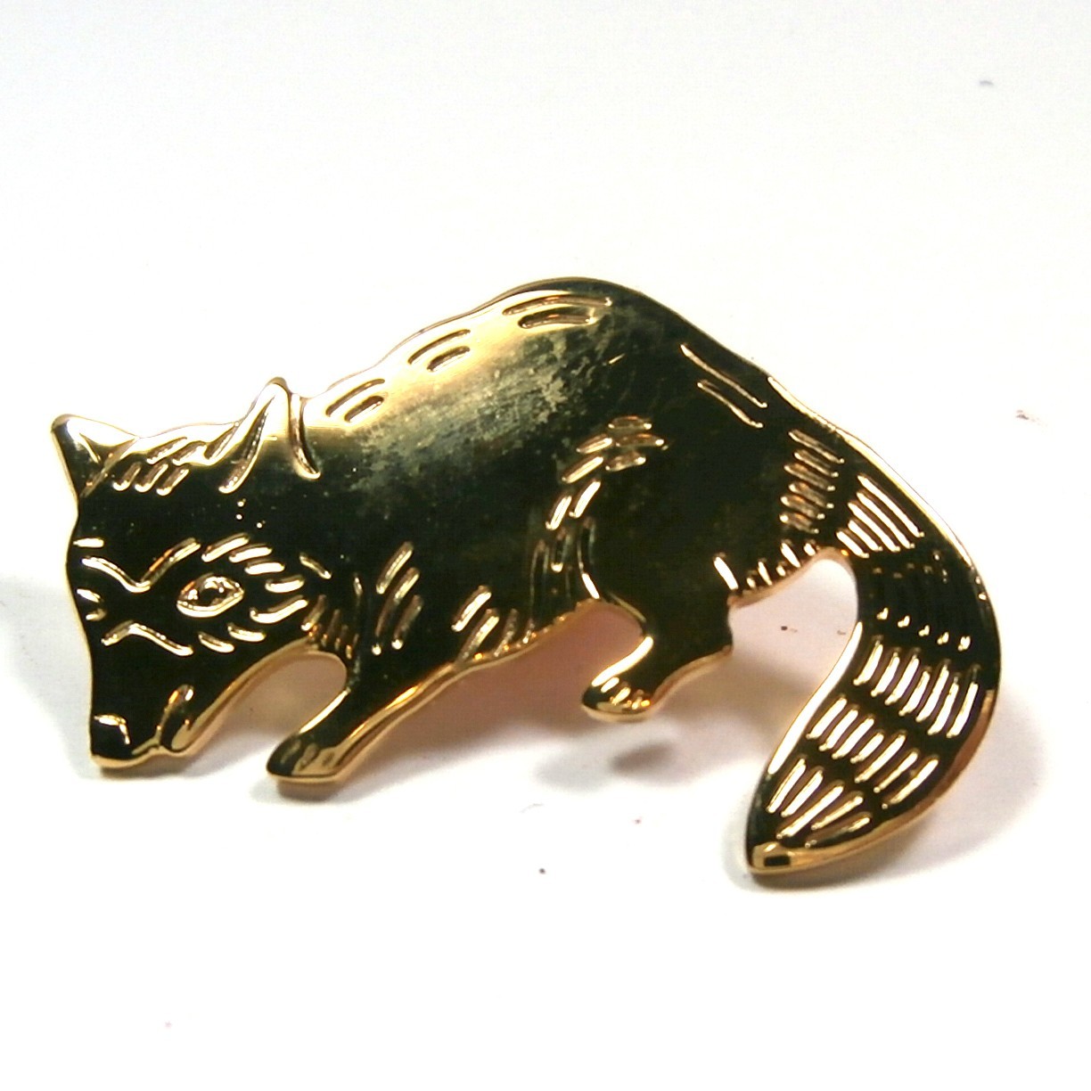 Large vintage gold tone detailed raccoon lapel or hat pin plastic tacks