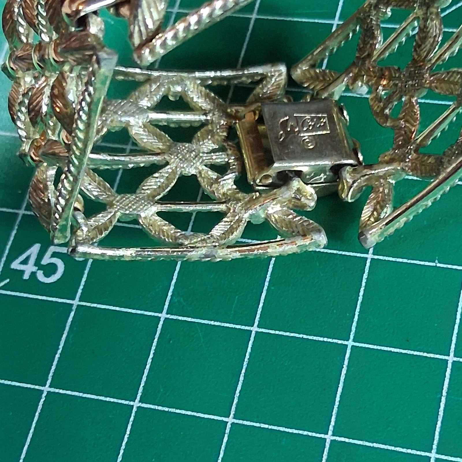 Vintage Cora Silver Tone Wide Band Floral Design Fold Over Clasp Bracelet