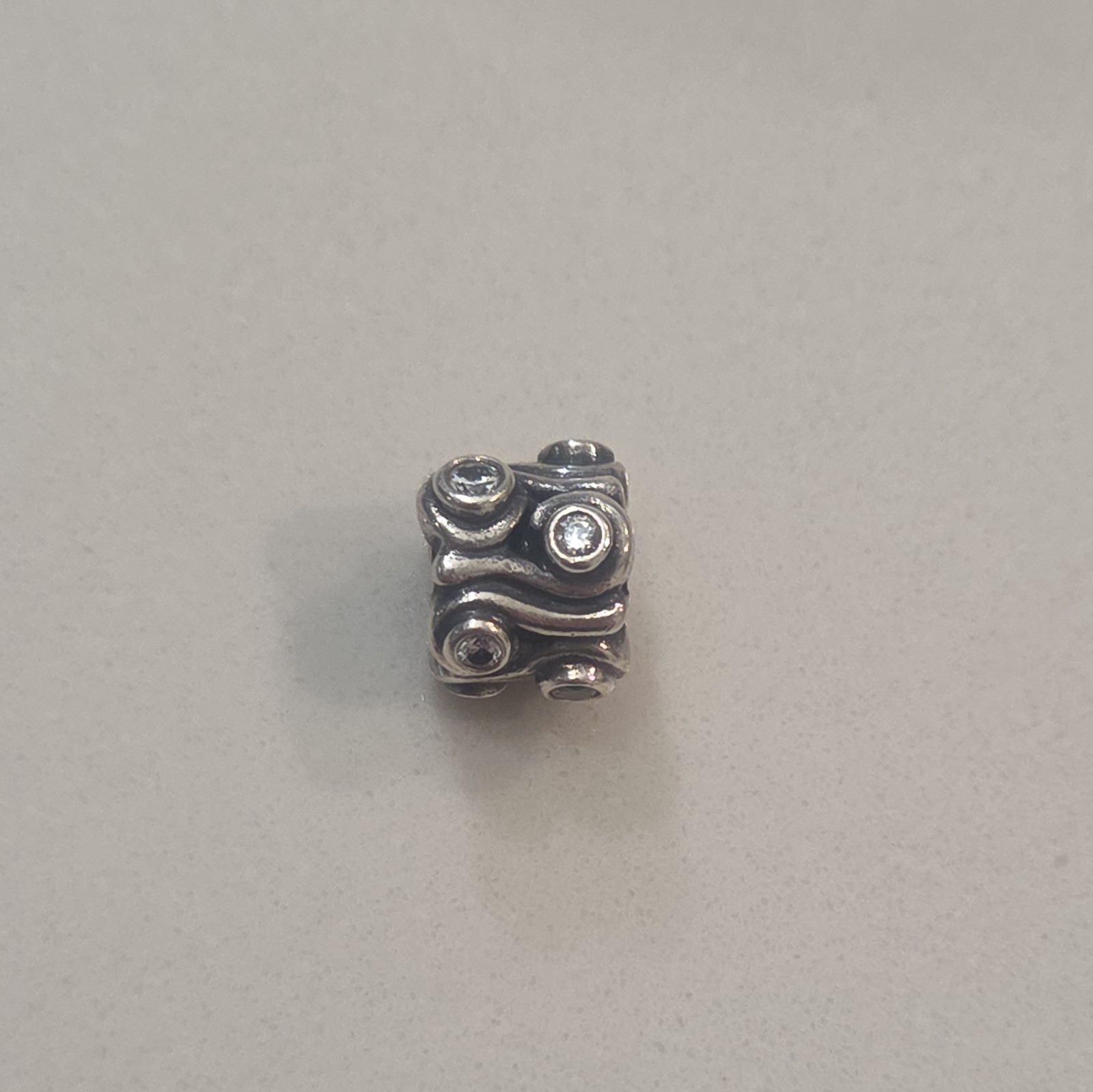 PANDORA OCEAN WAVE CHARM STERLING SILVER CLEAR CZ RETIRED 790369CZ BOX