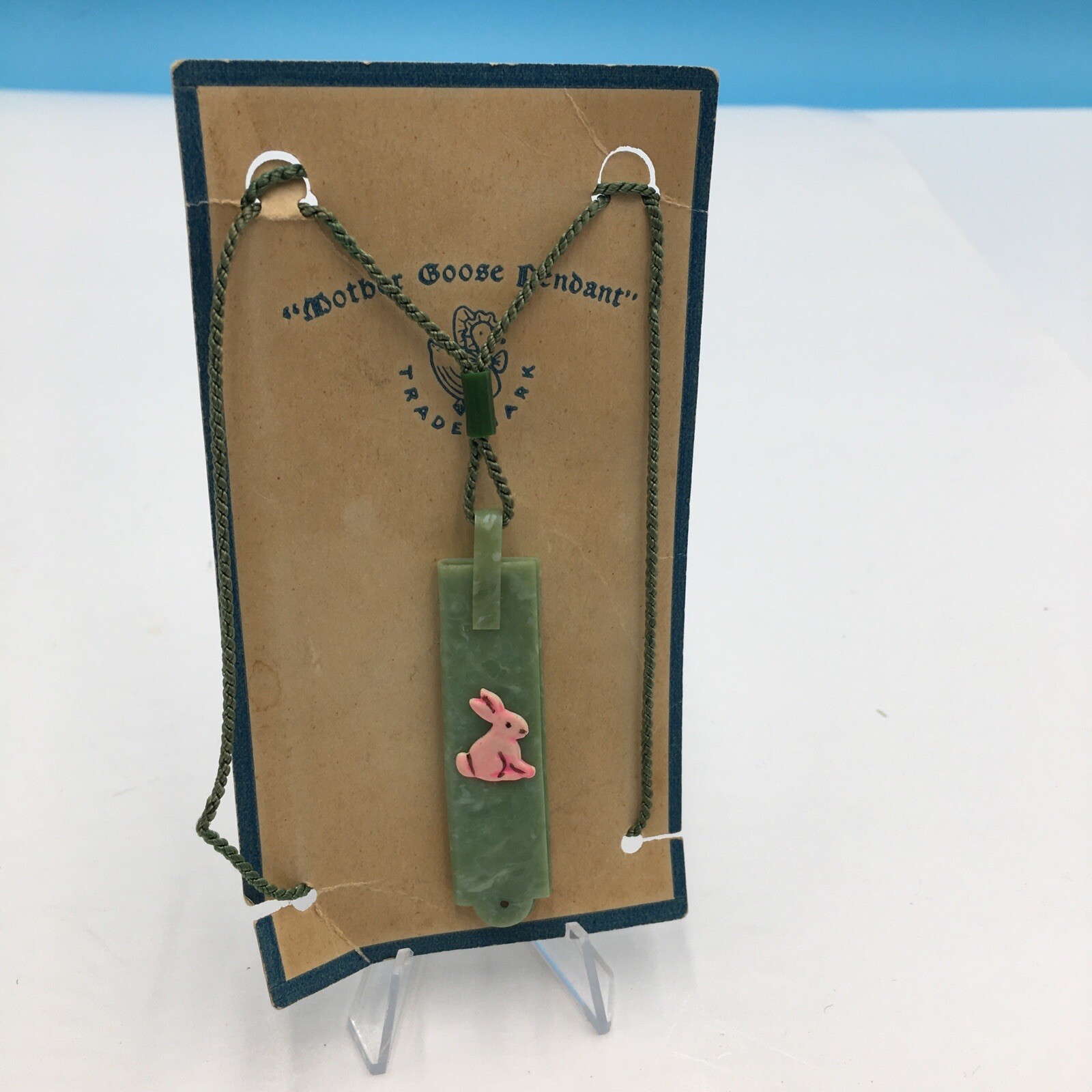 Vintage Easter Bunny green celluoid fold out Comb Childs Mother Goose Pendant