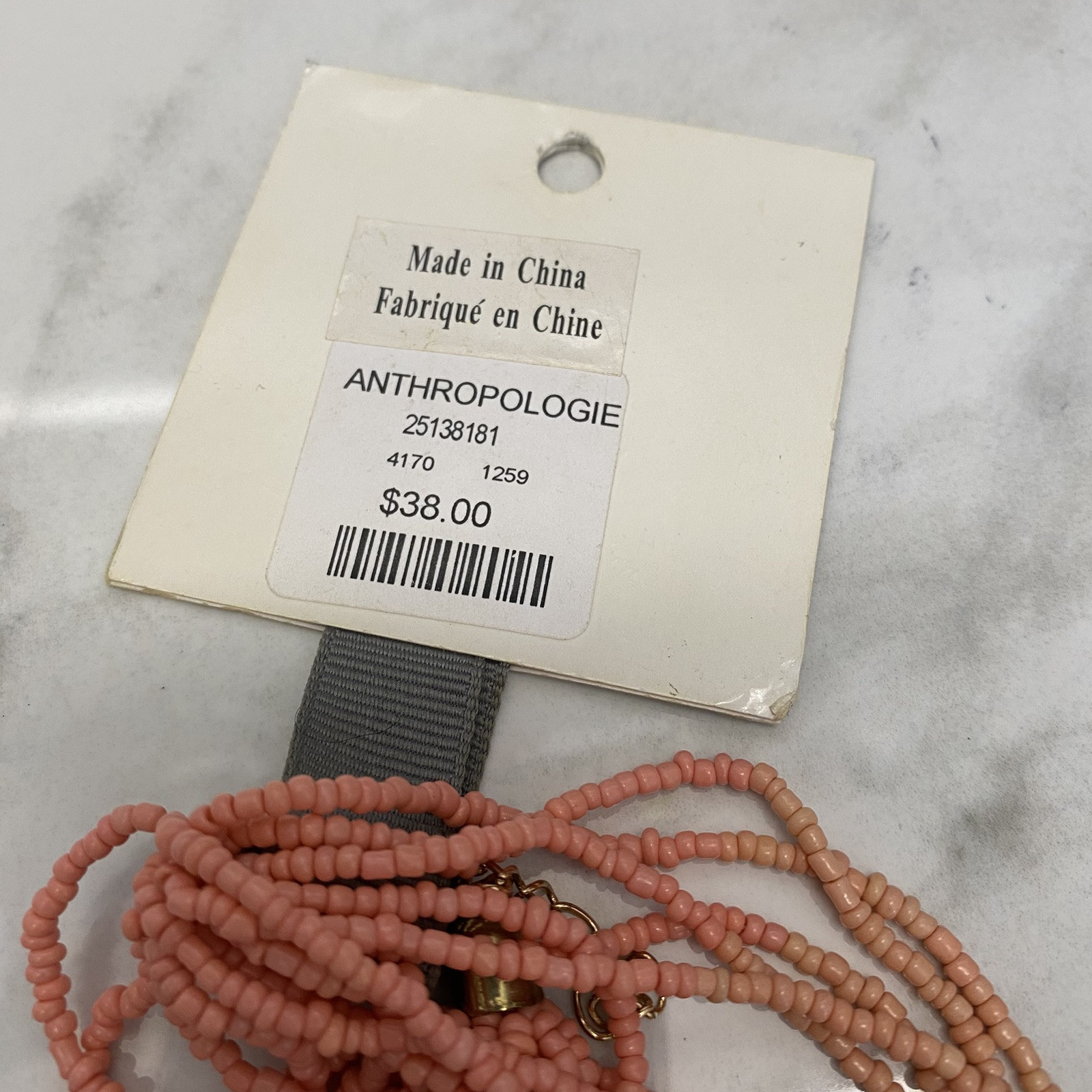 New Seed Bead Necklace by Anthropologie salmon pink gold NWT $38. Multi Strand