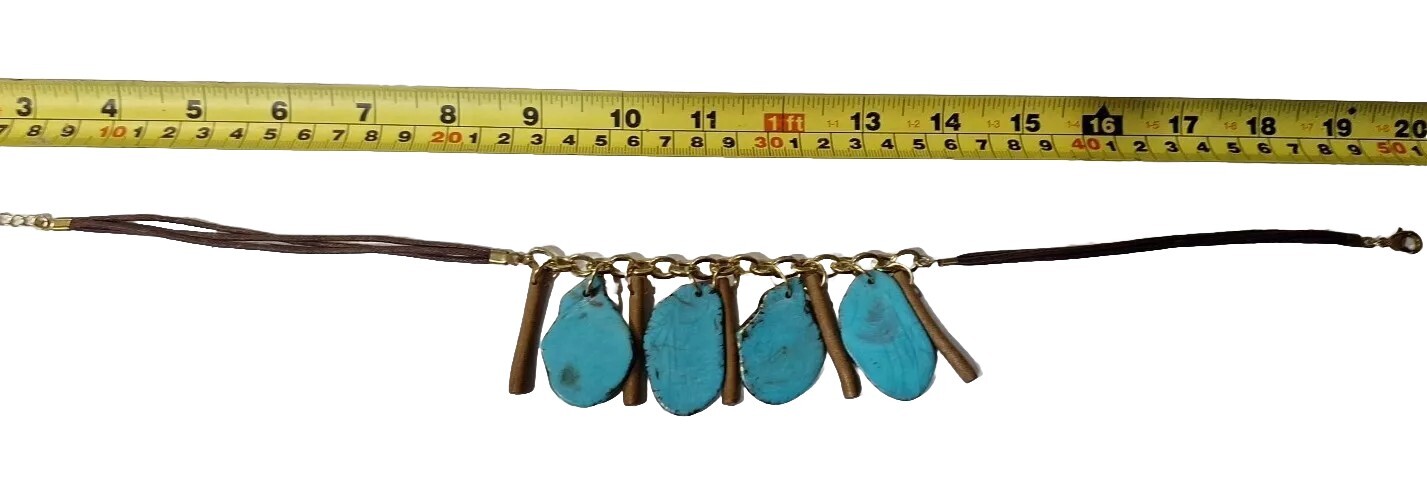 ladies turquoise Necklace On Gold And Leather Can Be 16 Ins To 20 Ins Long