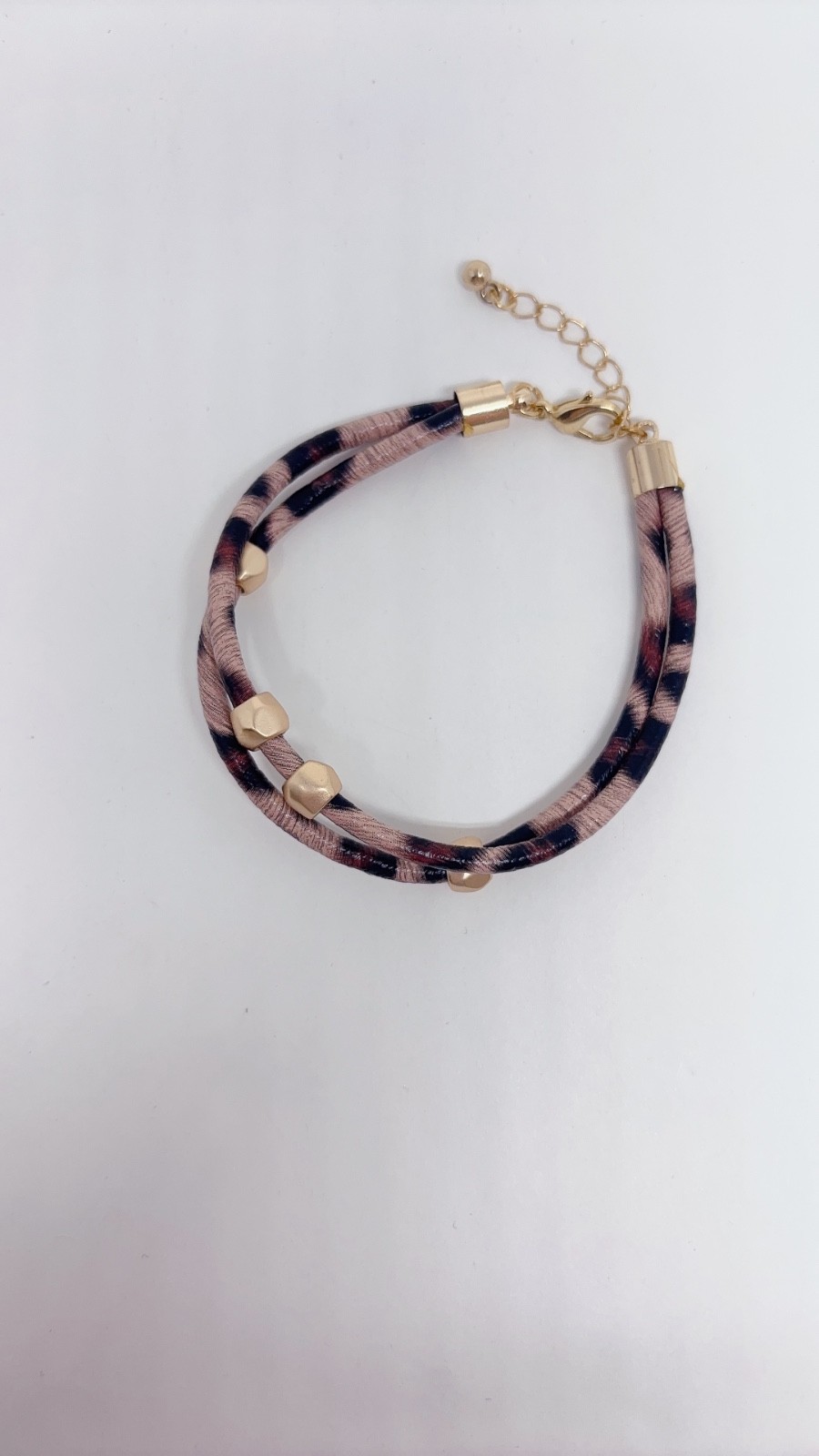 5 Piece Black, Pink, and Gold Bracelets with different Carves and Designs