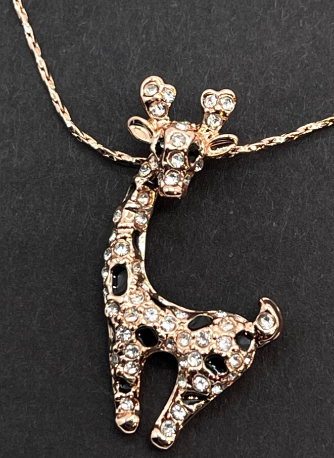 Necklace. Yellow Gold Plated Giraffe on 18 Inch Twist Chain w/2″ ext.