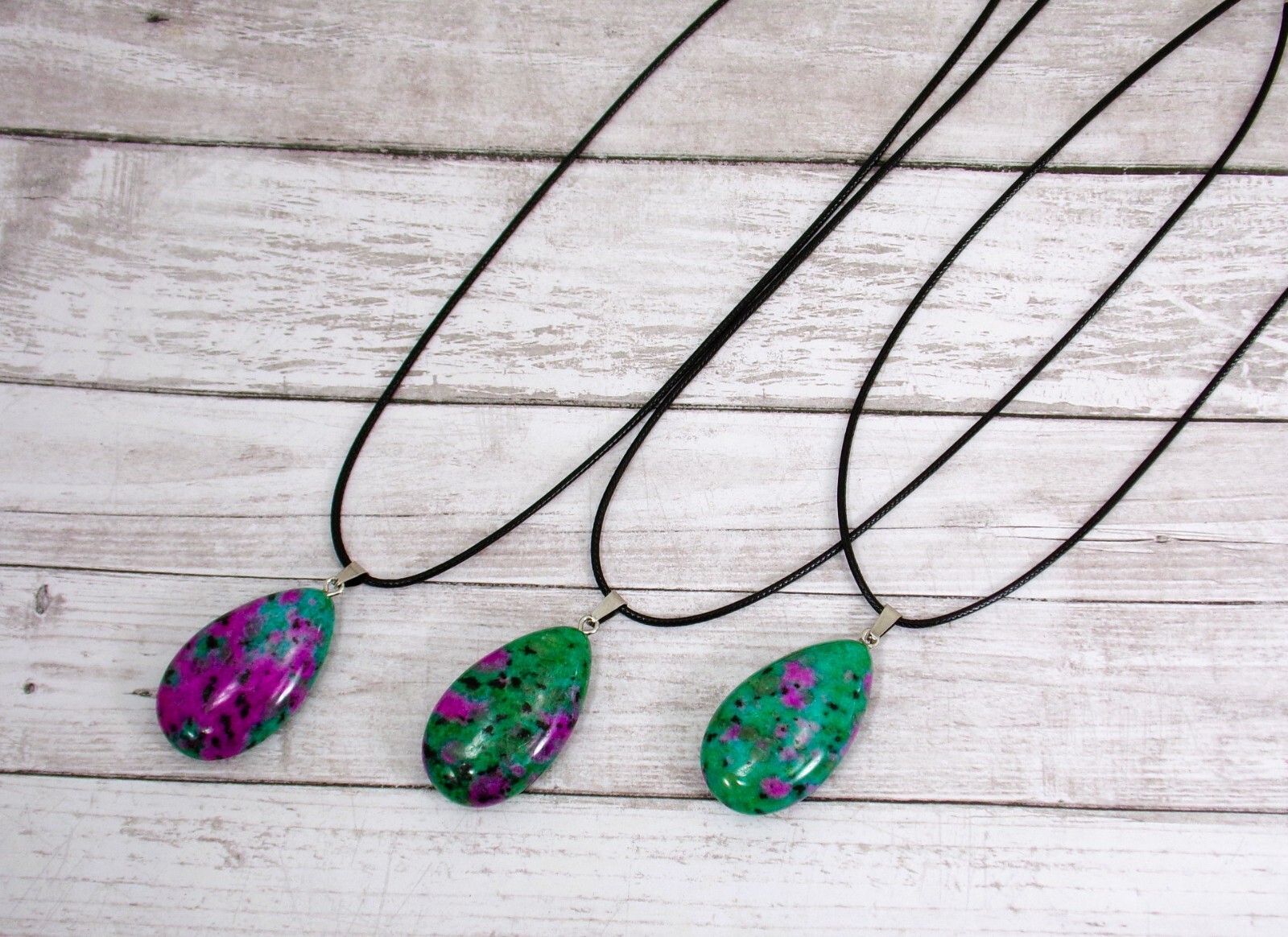 Natural ruby in zoisite teardrop stone pendant necklace on black cord New