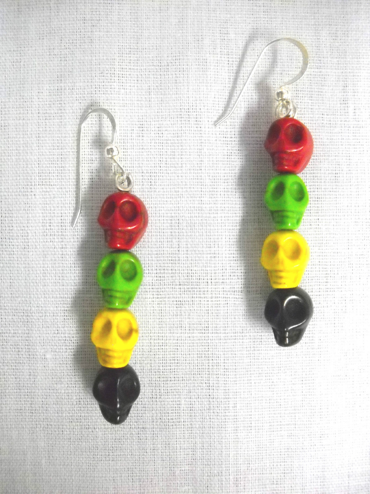 CARVED SKULLS RED GREEN YELLOW BLACK RASTA COLORS SKULL STERLING WIRES EARRINGS