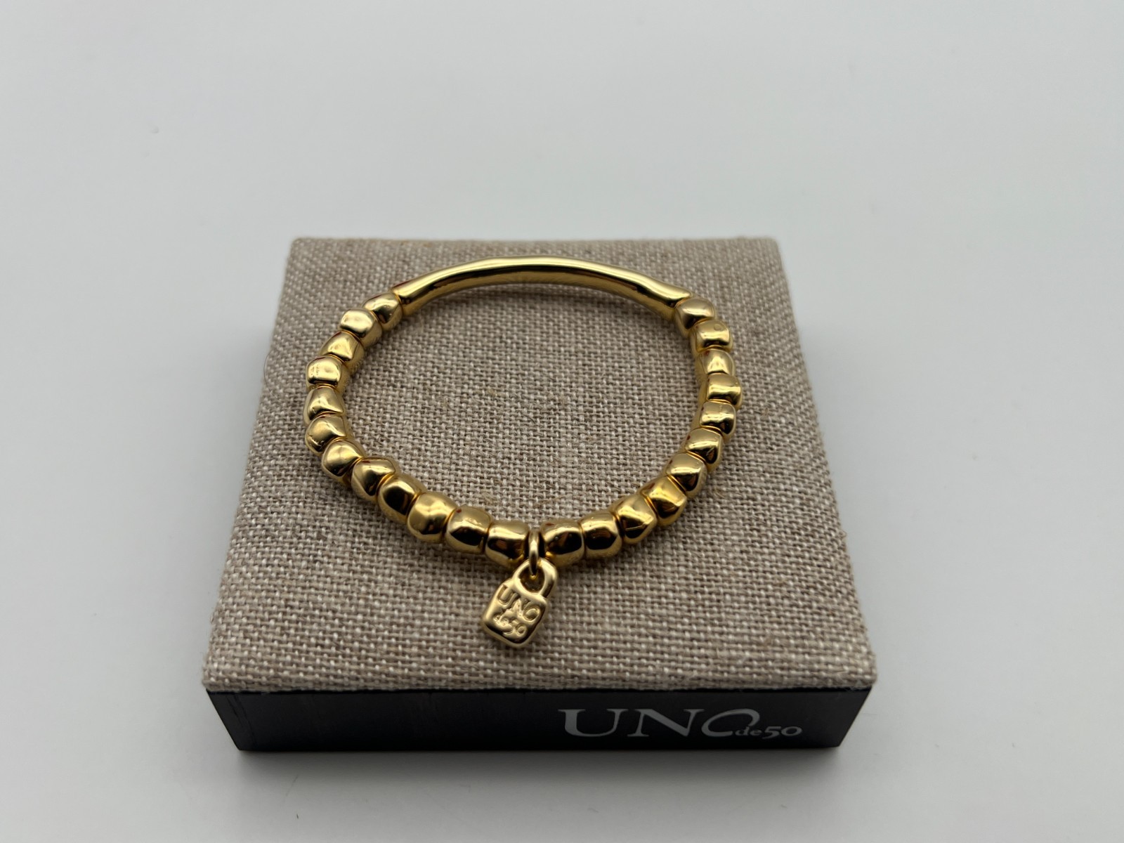 NEW Uno de 50 JOURNEY 18K Gold Plated Stretch Bracelet Tubular Piece Medium