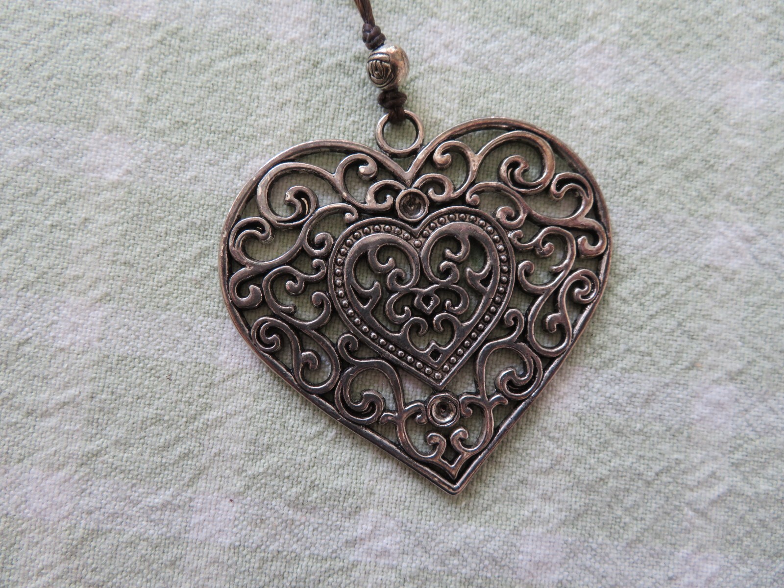 VINTAGE – APPROX. 20″ LONG BLACK & SILVER BEADED- HEART SHAPED NECKLACE
