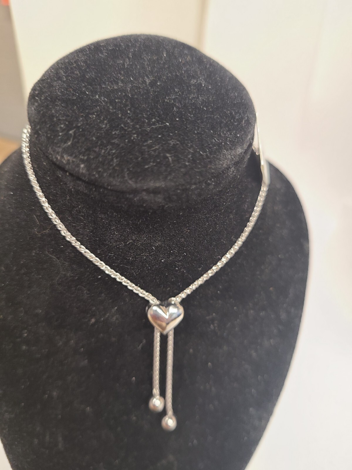 5.0mm Heart-Shaped Lab-Created Ruby and White Sapphire Frame Heartbeat Bolo Brac