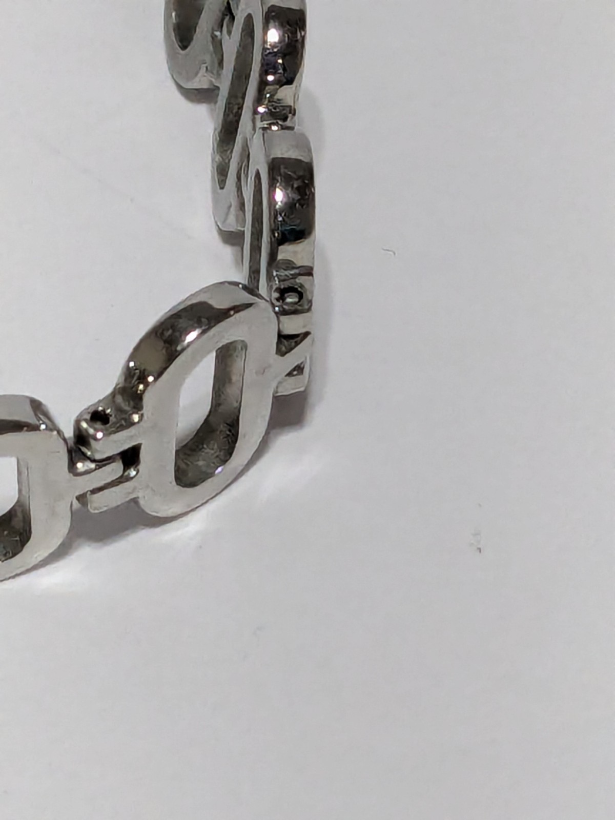 Maite Silver Tone Stainless Steel Oval Link Fold Over Clasp Bracelet 7.75″