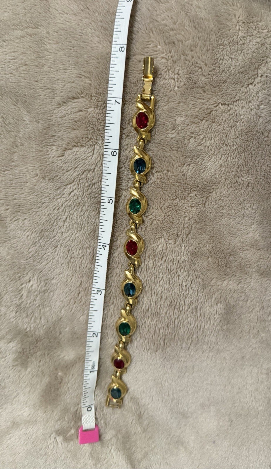 Gold Tone ￼ Costume, jewelry bracelet. With Purple Red And Green Colored Stones