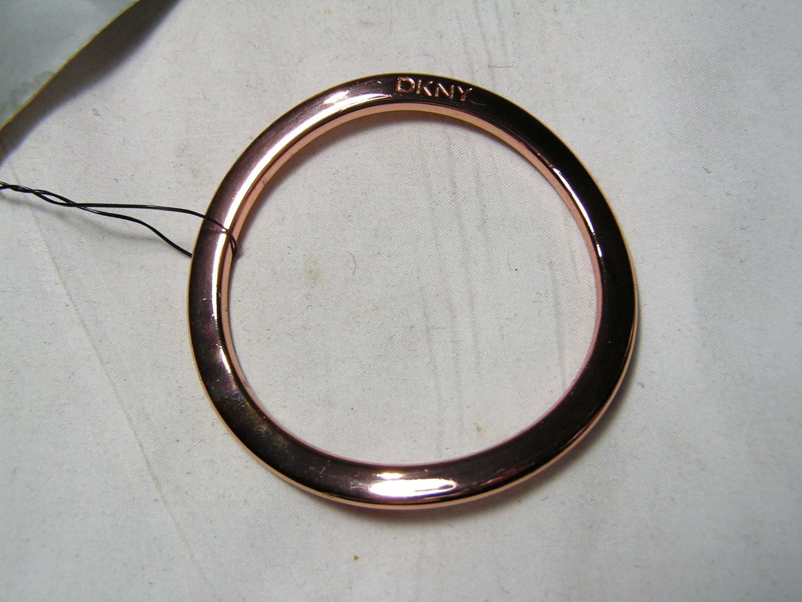 …DKNY Donna Karan…Rose Gold Tone Wavy Design Bangle Bracelet…Small Size…