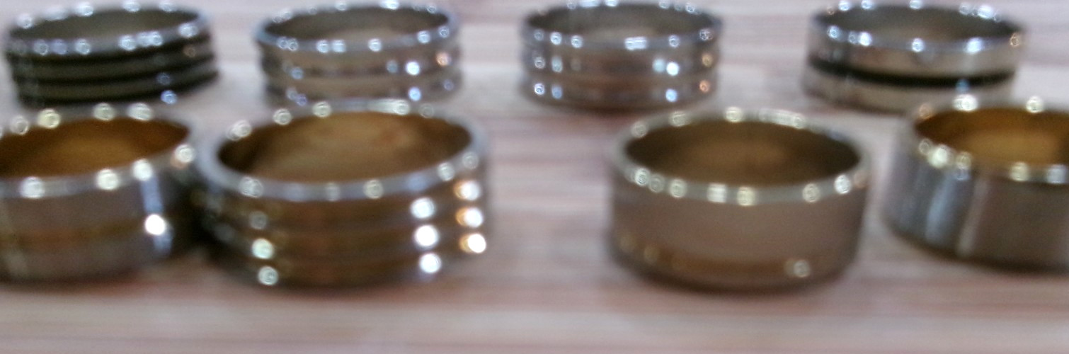 Lot of 24 Band Style Rings-Goldtone/Silvertone/Black Sizes 7-11