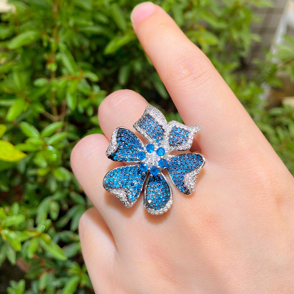 Adjustable 3D Geometric Flower Pave Setting Blue Cubic Zirconia Engagement Ring